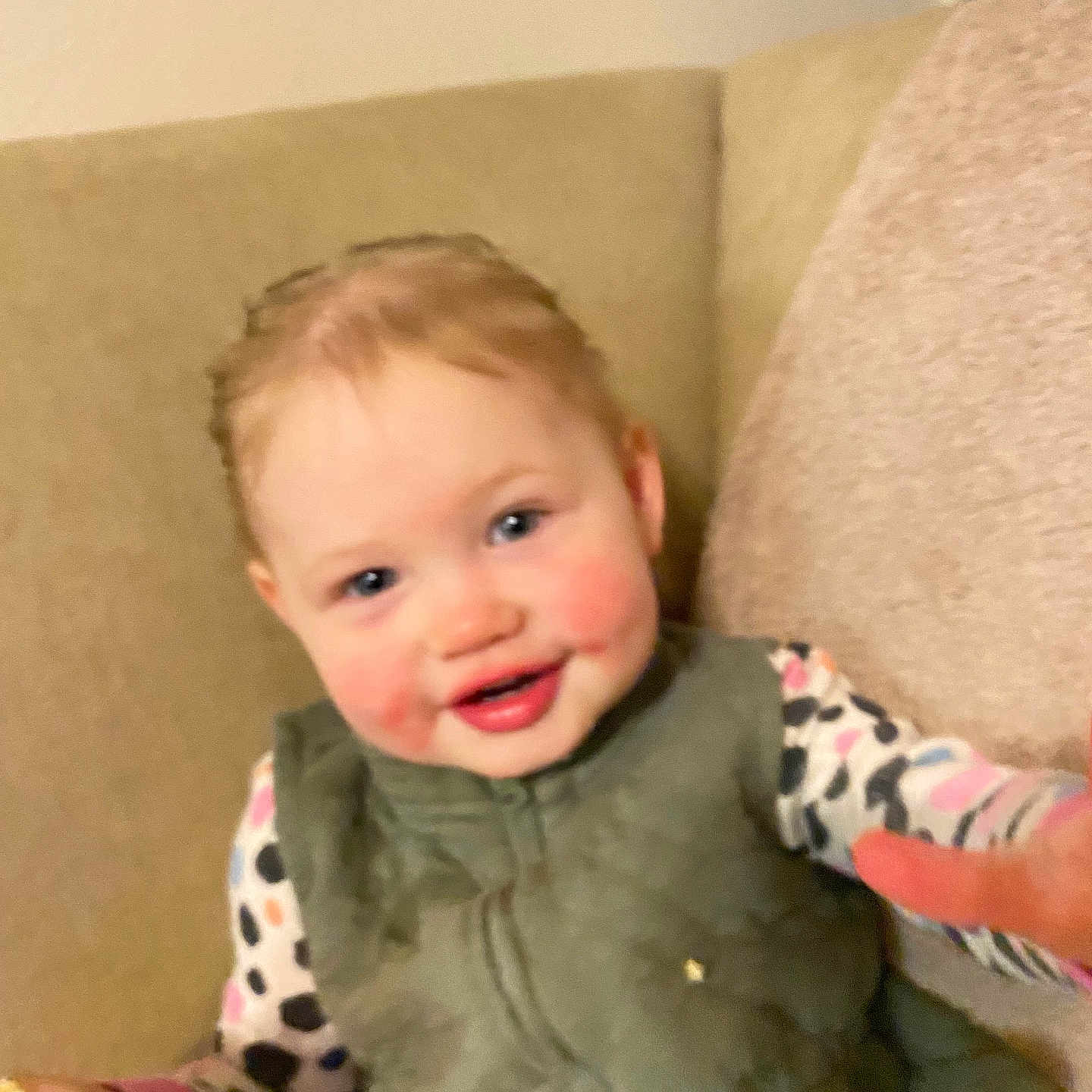 Skarlett joined the competition — help win amazing prizes! baby, bodypart, clothing, coat, couch, cushion, face, finger, furniture, hand, happy, head, homedecor, hosiery, jacket, person, photography, portrait, smile, sock