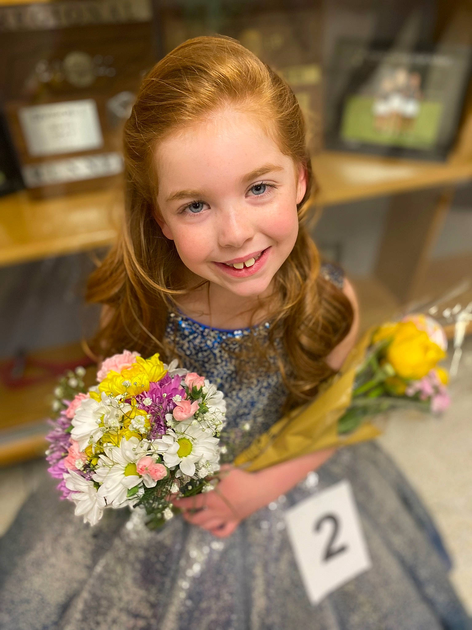 Julianna joined the competition — help win amazing prizes! annual_plant, bouquet, brown_hair, child, cut_flowers, event, floral_design, floristry, flower, flower_arranging, fun, happy, iris, joy, party, person, petal, plant, room, smile