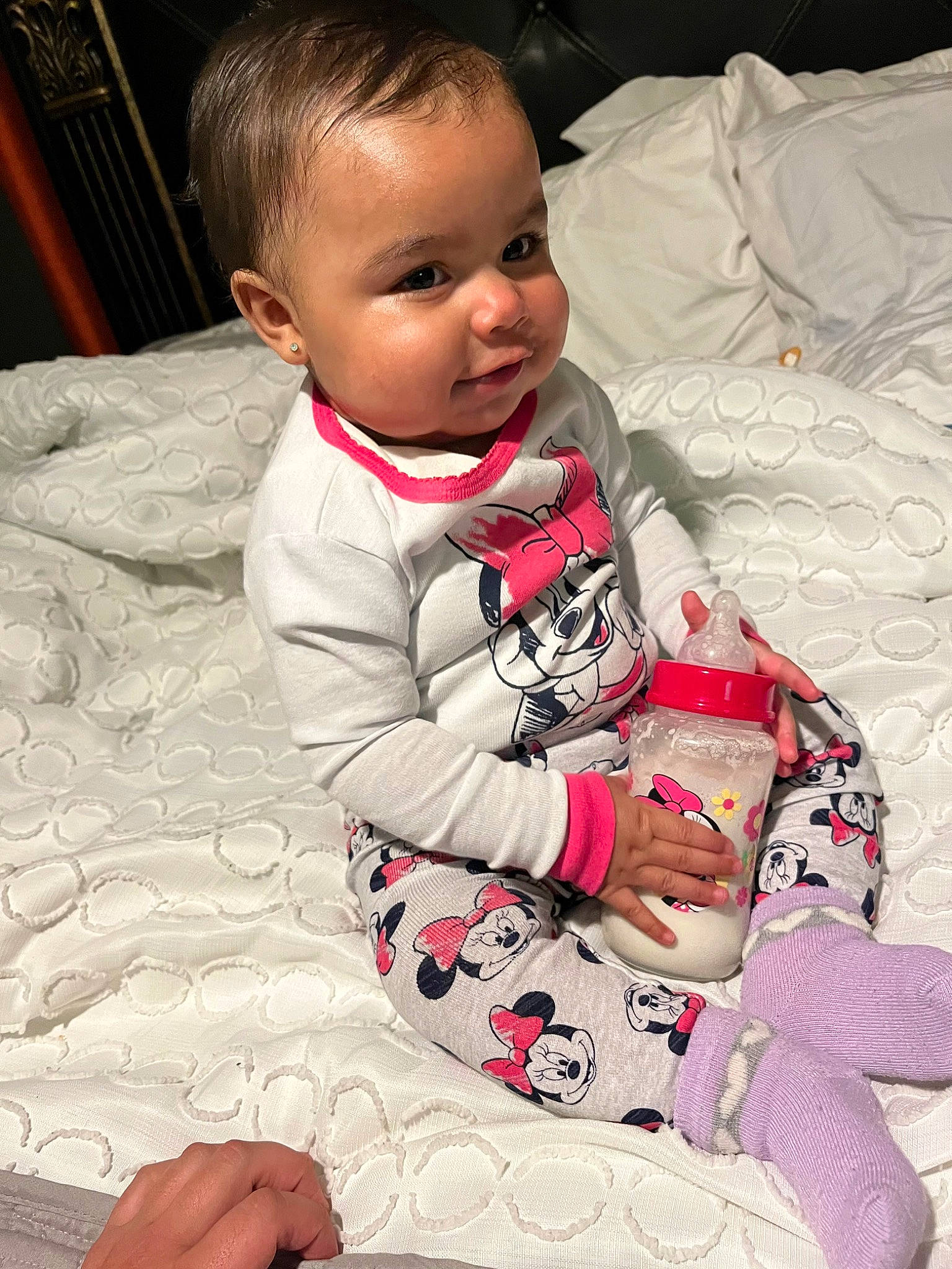 Alicia is registered to the contest to win money with this photo: baby, baby_products, baby_toddler_clothing, carmine, cheek, child, comfort, finger, flooring, happy, head, human_body, lap, linens, pattern, person, room, sitting, skin, sleeve