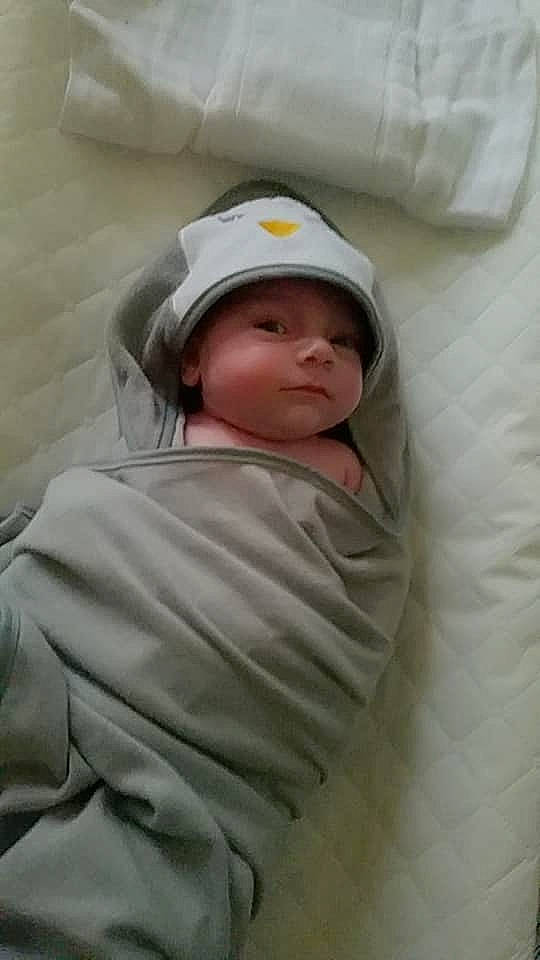 Tobee is registered to the contest to win money with this photo: baby, baby_products, baby_sleeping, baby_toddler_clothing, bedding, bedtime, cap, cheek, child, comfort, headwear, hoodie, linens, nap, person, room, sleep, sleeve, toddler