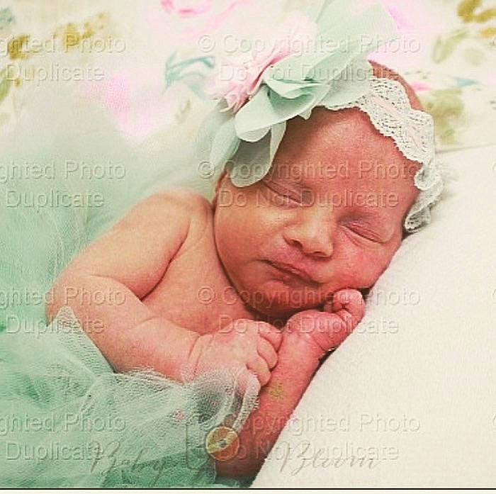 Addisyn Roberson is registered to the contest to win money with this photo: baby, baby_sleeping, birth, cheek, child, close_up, forehead, hair_accessory, hand, head, nap, nose, person, photograph, photography, pink, skin, sleep, stock_photography, textile