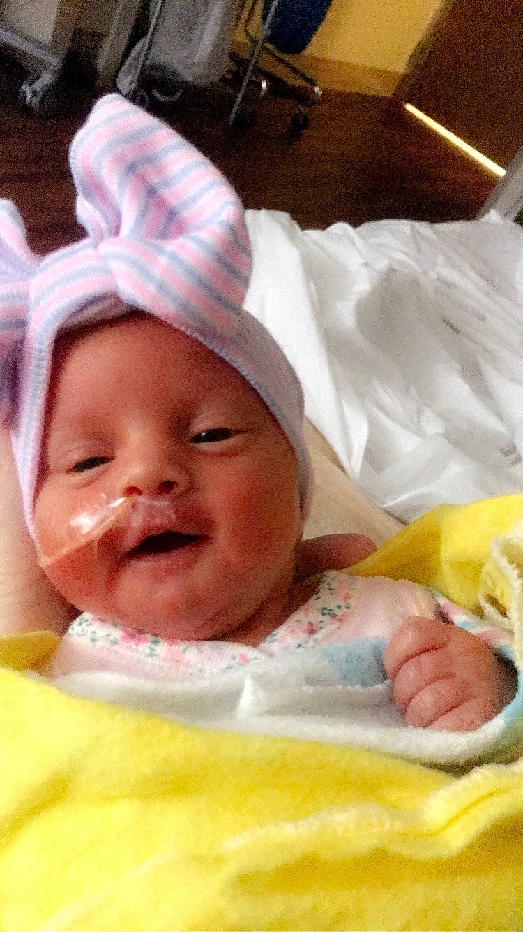 Brailyn Roberson joined the competition — help win amazing prizes! baby, baby_products, child, headwear, person, product, skin, smile, toddler, yellow