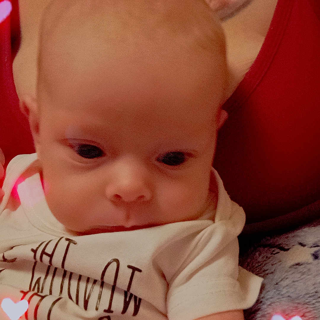 Lilith joined the competition — help win amazing prizes! baby, bodypart, clothing, couch, face, finger, furniture, hand, handwriting, head, mouth, newborn, pattern, person, photography, portrait, skin, t_shirt, tattoo, text