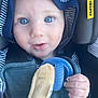 Dustin is registered to the contest to win money with this photo: baby, child, blue_eyes, hood, striped_clothing, car_seat, pacifier, plush_toy, hand, infant, cute, close_up, safety_harness, seatbelt, portrait, soft_toy, indoor, expression, person, young_child