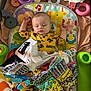 Opal is registered to the contest to win money with this photo: baby, blanket, cartoon_giraffe, colorful, cute, hawkeyes, infant, mobile, nursery, onesie, peaceful, playmat, playpen, plush, portrait, rattle, ring_toy, sleeping_baby, stuffed_animal, toys