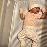 Arianna joined the competition — help win amazing prizes! newborn, baby, sleeping, infant, crib, mattress, striped, onesie, mittens, hat, clothing, portrait, indoors, nursery, peaceful, resting, lying_down, blanket, photography, cute