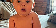 Waylon joined the competition — help win amazing prizes! baby, infant, child, naked, bed, room, wooden_wall, curtains, window, foot, hand, skin, expression, wide_eyes, surprised, indoors, soft_light, cozy, plush, person