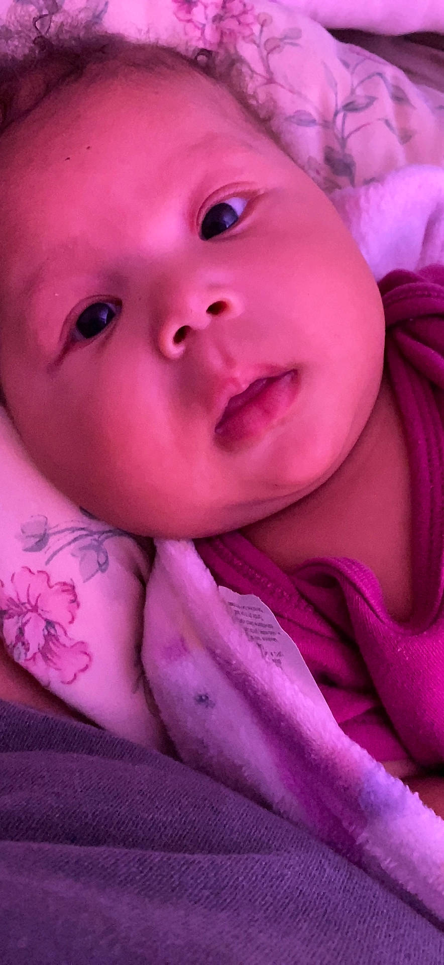 Angelina is registered to the contest to win money with this photo: baby, baby_toddler_clothing, beauty, cheek, close_up, eyelash, happy, iris, lip, magenta, nail, nose, person, petal, pink, purple, skin, smile, textile, toddler