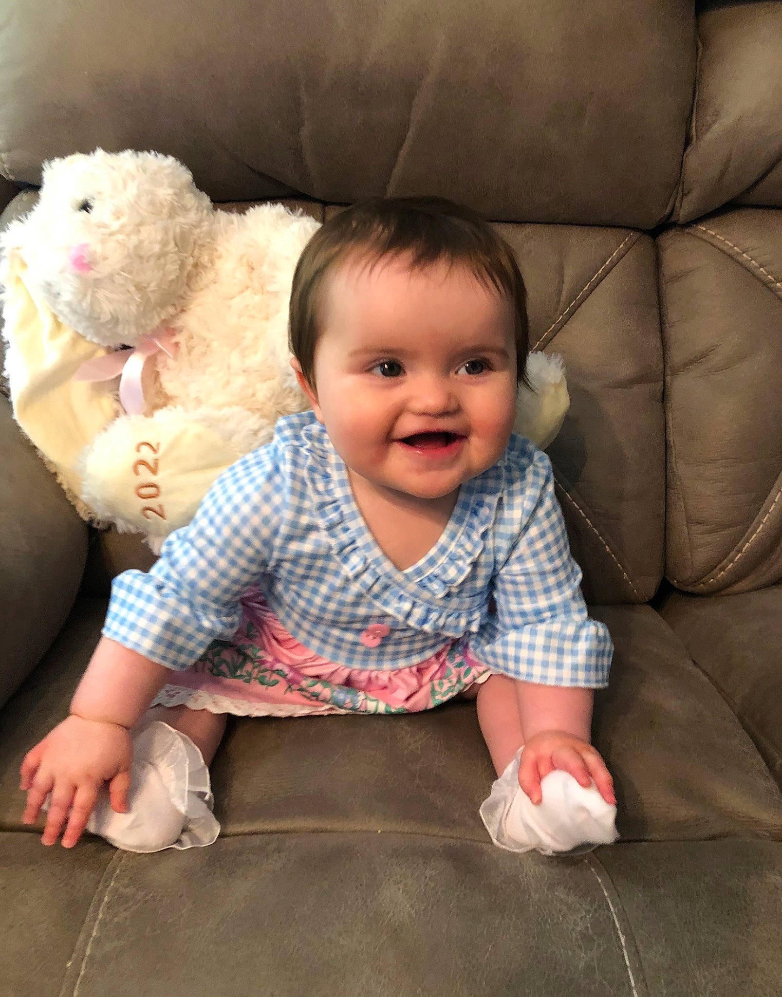 Londyn joined the competition — help win amazing prizes! baby, baby_toddler_clothing, cheek, child, comfort, couch, eye, face, flooring, happy, head, joy, nose, person, product, skin, sleeve, smile, teddy_bear, textile