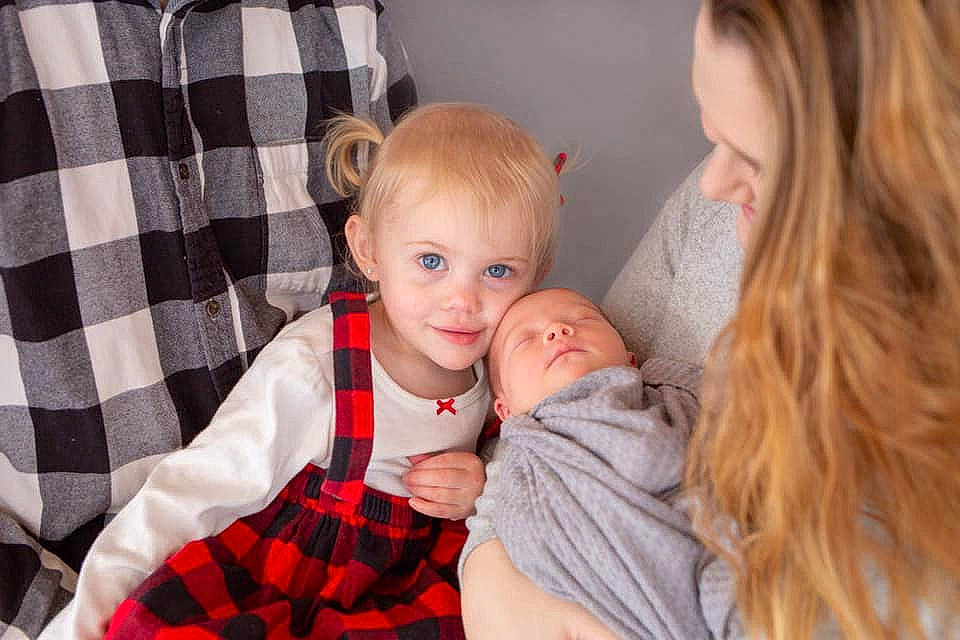 Sadie-mae is registered to the contest to win money with this photo: baby, blond, cheek, child, design, family, joy, pattern, people, person, plaid, sibling, smile, tartan, textile, toddler