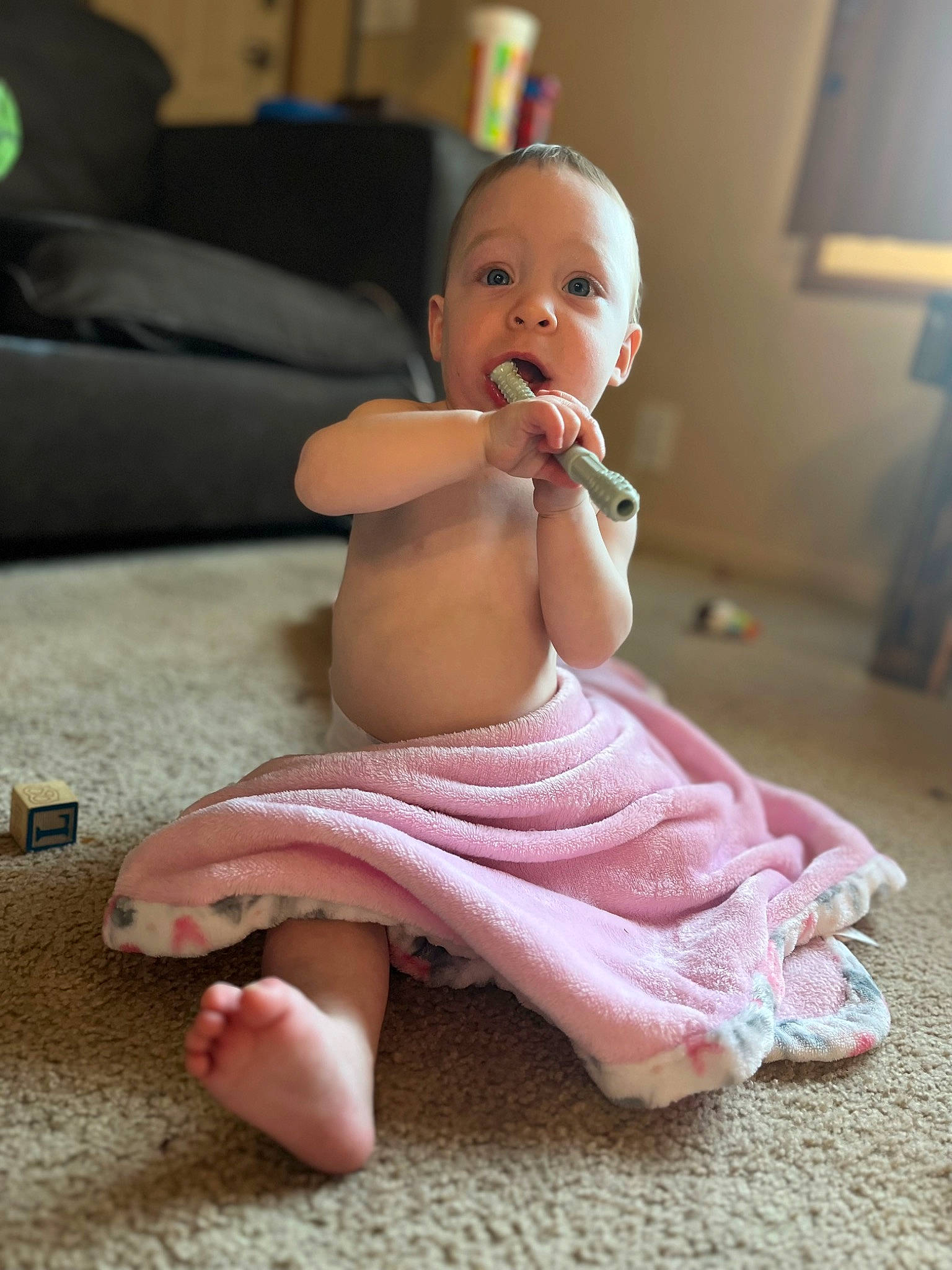 Baylee joined the competition — help win amazing prizes! abdomen, baby, baby_toddler_clothing, barefoot, cheek, comfort, floor, flooring, foot, hand, happy, head, human_leg, knee, person, picture_frame, pink, skin, surprise, thigh