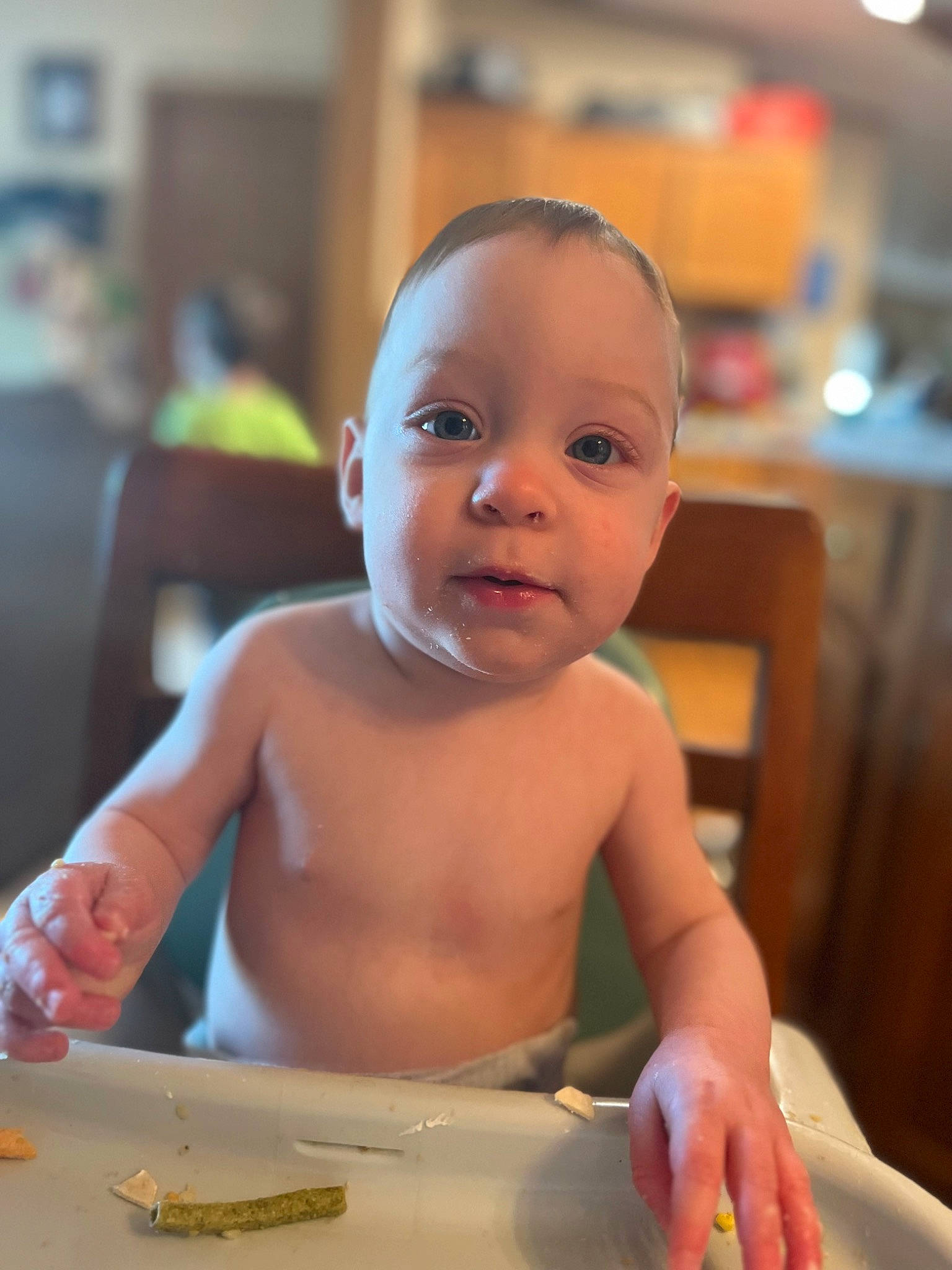 Baylee is registered to the contest to win money with this photo: abdomen, baby, bathing, chair, cheek, chest, child, cutlery, finger, fun, happy, kitchen_utensil, knife, person, room, sitting, smile, table, tableware, thumb