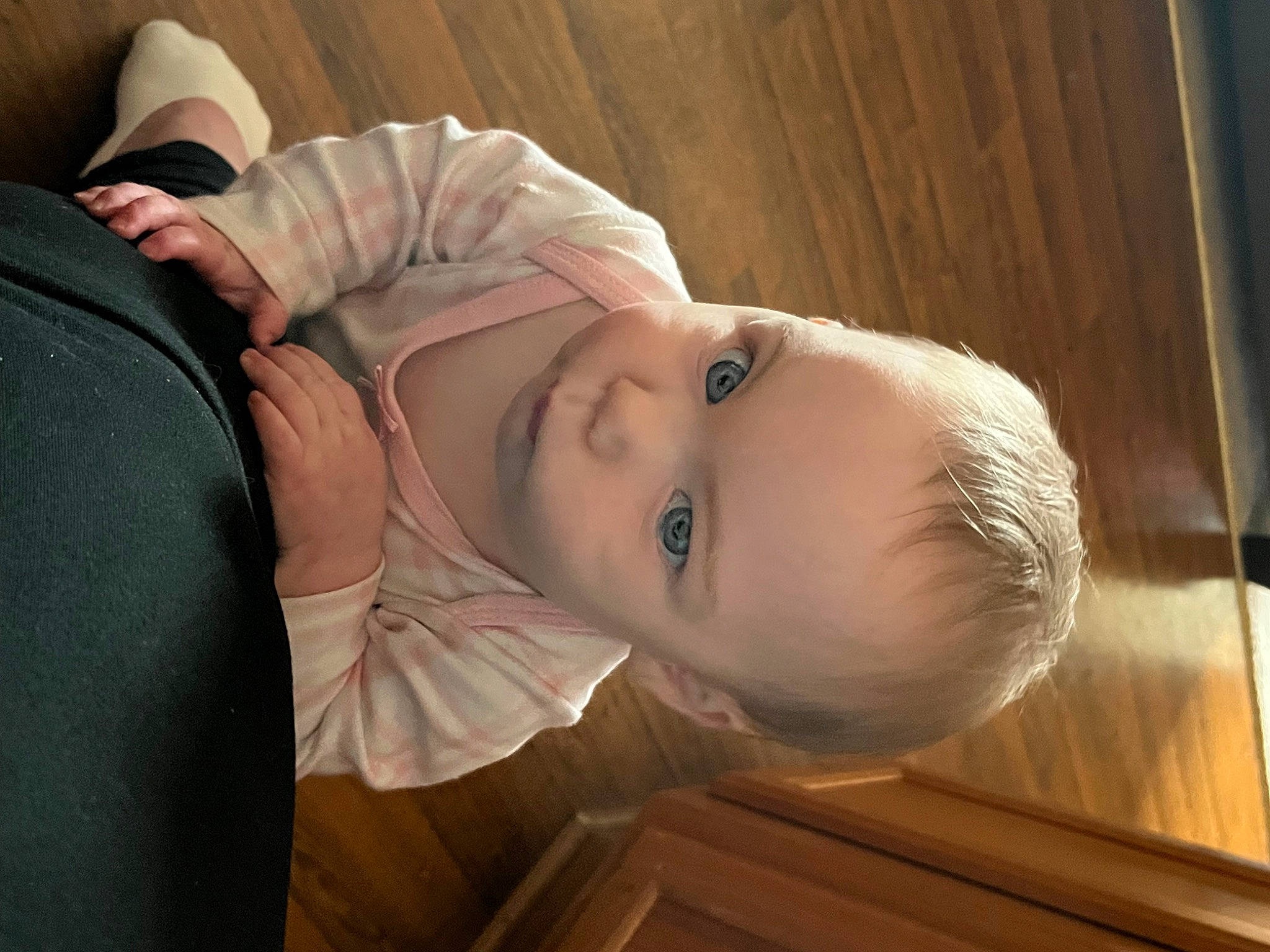 Traci is registered to the contest to win money with this photo: abdomen, baby, baby_toddler_clothing, cheek, chest, child, comfort, elbow, eyelash, flash_photography, happy, hardwood, hat, lip, neck, nose, person, skin, sleeve, toddler