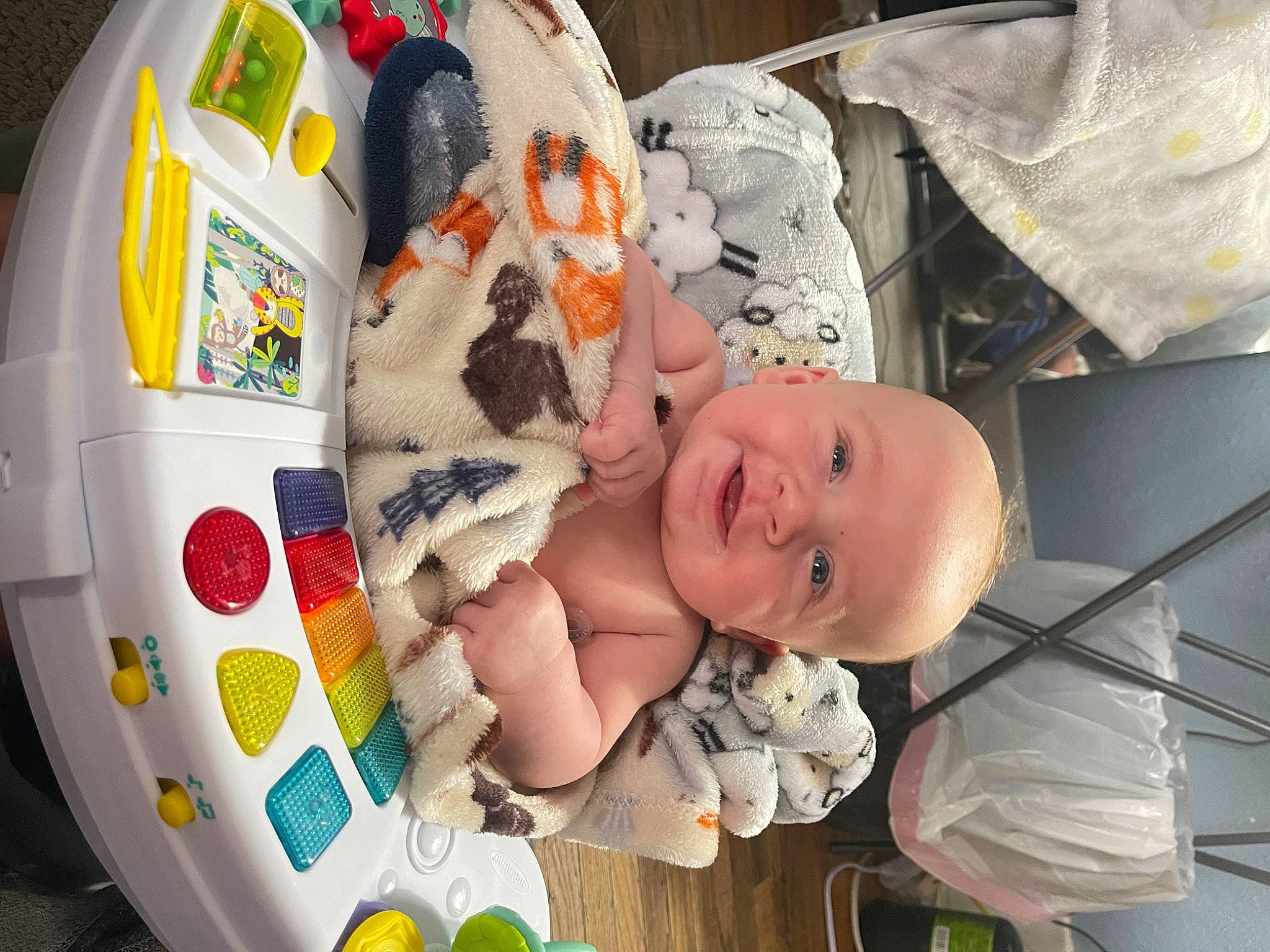 Hayden is registered to the contest to win money with this photo: baby, baby_carriage, baby_products, baby_safety, baby_toddler_clothing, baby_toys, cheek, child, comfort, fun, happy, infant_bed, people, person, product, room, smile, stuffed_toy, toddler, toy