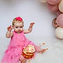 baby, child, pink_dress, cake, cake_smash, balloons, messy, birthday, celebration, cute, smiling, sitting, food, frosting, crumbs, foot, hand, party, decorations, portrait