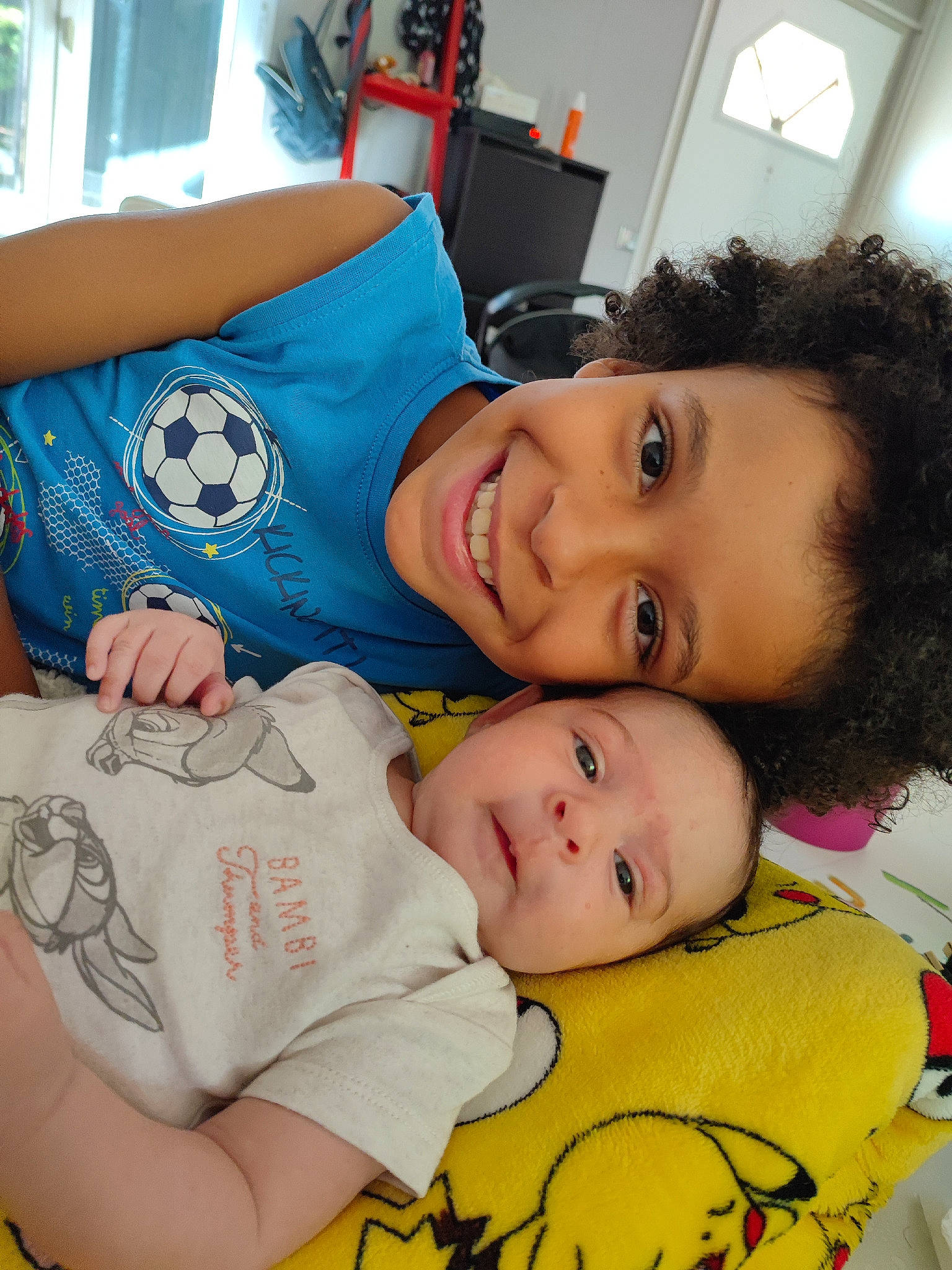 Jahnael participe au concours pour gagner de l'argent avec cette photo : baby, baby_products, baby_toddler_clothing, cheek, child, comfort, eye, facial_expression, fun, happy, joy, mouth, nose, person, product, room, skin, sleeve, smile, t_shirt