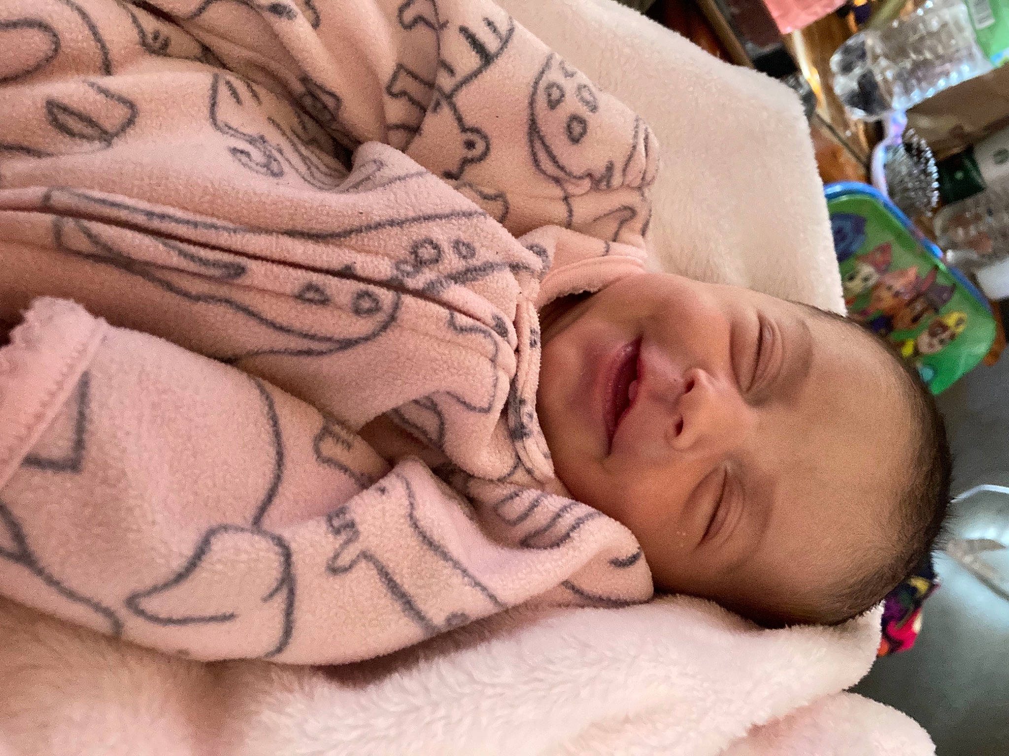 Raylynn is registered to the contest to win money with this photo: baby, baby_sleeping, bedding, bedtime, blanket, cheek, childbirth, comfort, flesh, linens, living_room, nap, peach, person, skin, sleep, textile, wool