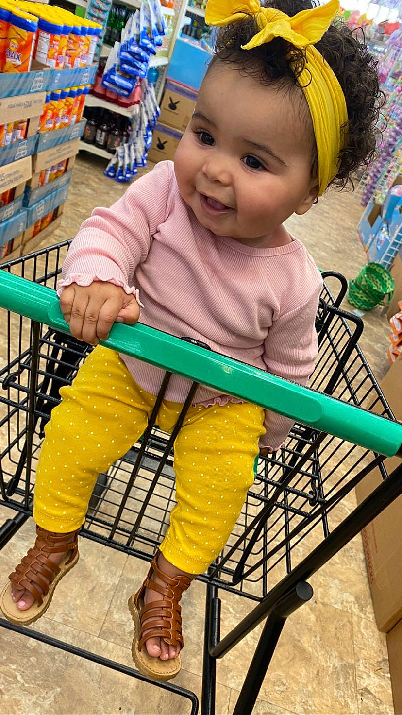 Everly joined the competition — help win amazing prizes! baby, baby_toddler_clothing, child, face, fun, green, happy, leg, leisure, organ, person, photograph, product, skin, sleeve, smile, standing, textile, tire, toddler