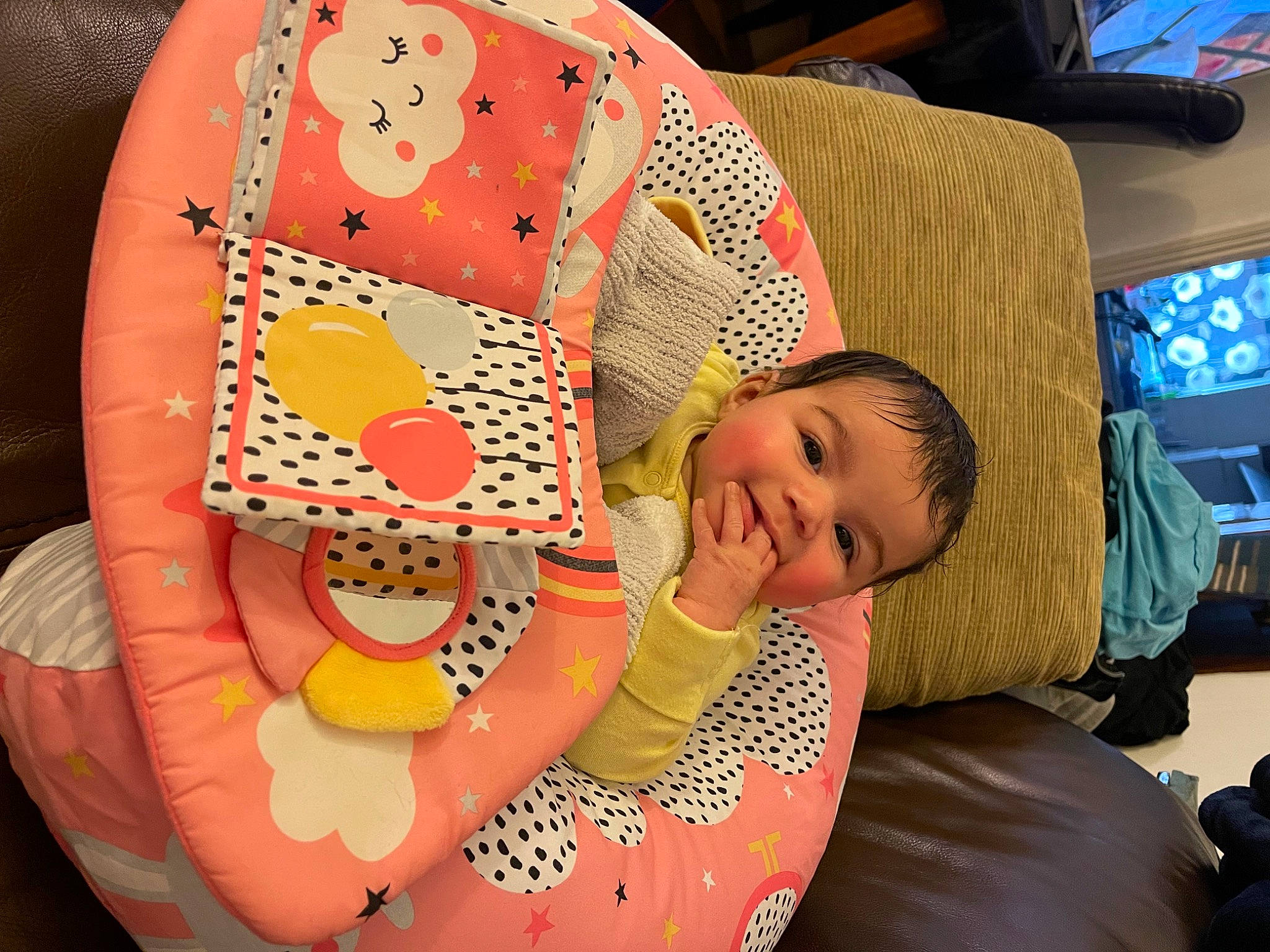 Clara joined the competition — help win amazing prizes! baby, baby_products, car_seat, chair, child, circle, comfort, computer_keyboard, couch, display_device, fun, linens, pattern, person, room, sitting, television, textile, toddler, visual_arts