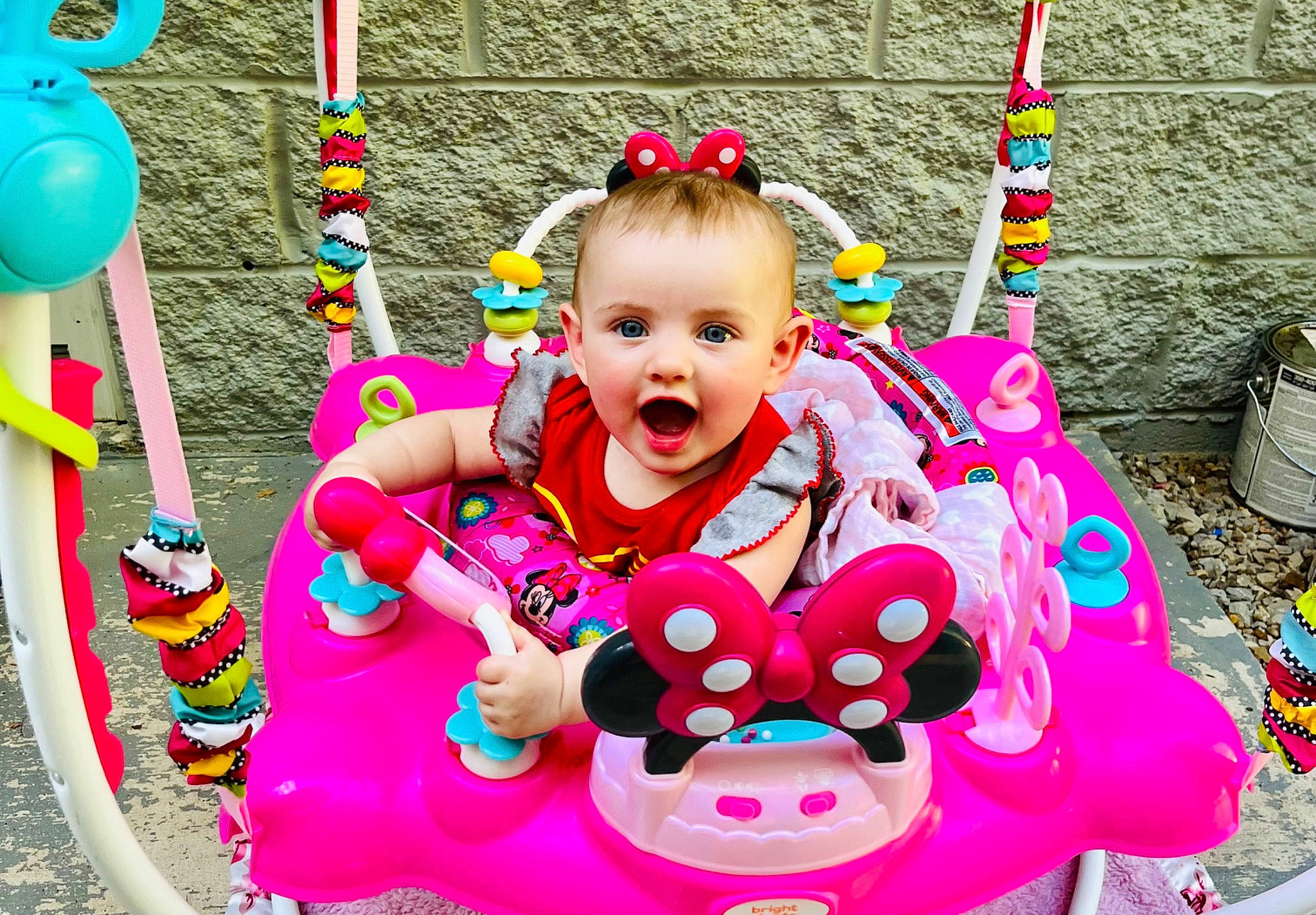 Elliana joined the competition — help win amazing prizes! baby, baby_products, baby_toddler_clothing, bag, child, event, fun, grass, green, happy, leisure, magenta, pattern, person, pink, play, recreation, sitting, smile, surprise