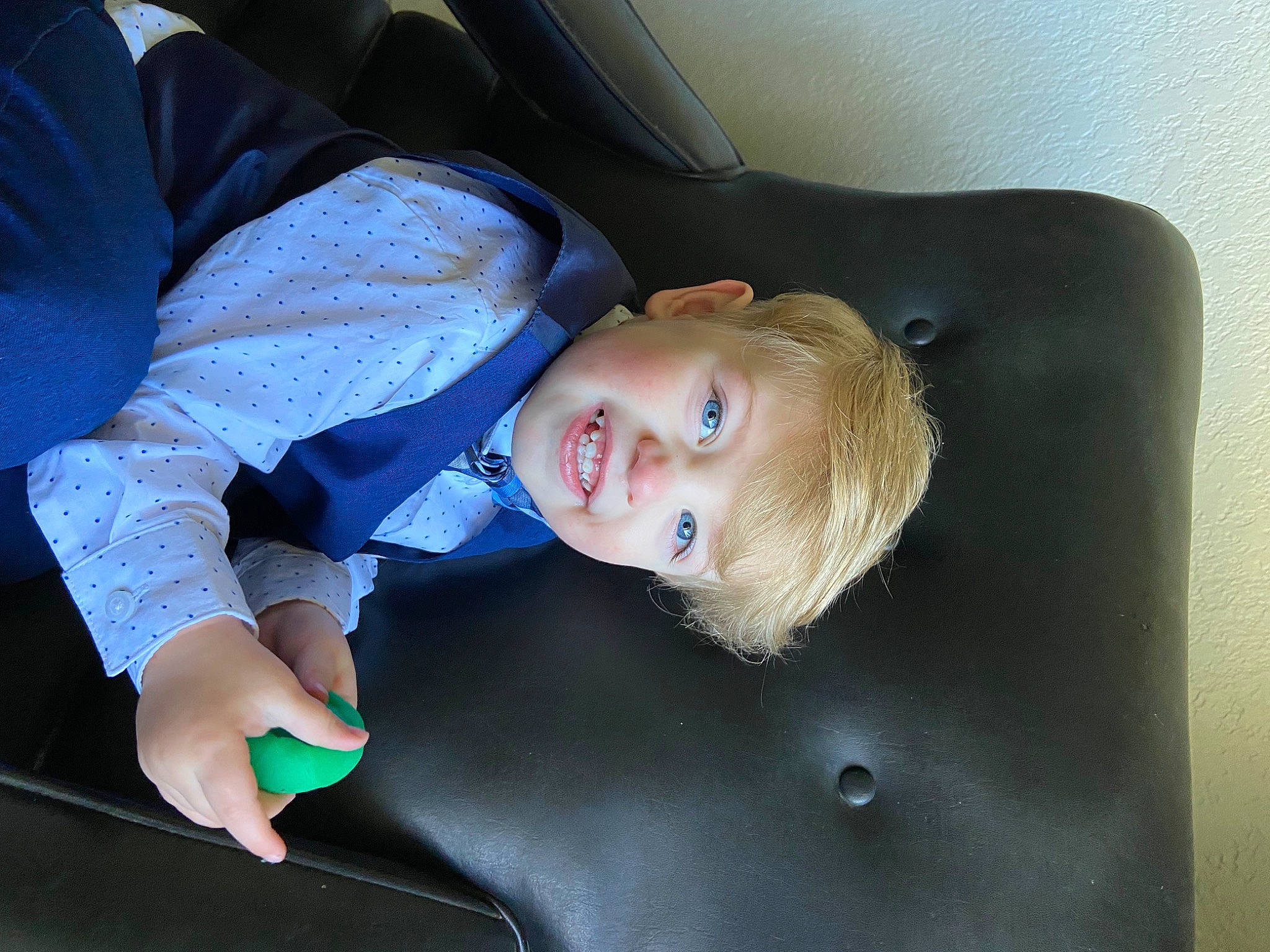 Parker is registered to the contest to win money with this photo: auto_part, baby_toddler_clothing, car_seat, child, comfort, elbow, electric_blue, family_car, flash_photography, fun, luxury_vehicle, person, sitting, smile, toddler, vacation, vehicle_door, wood