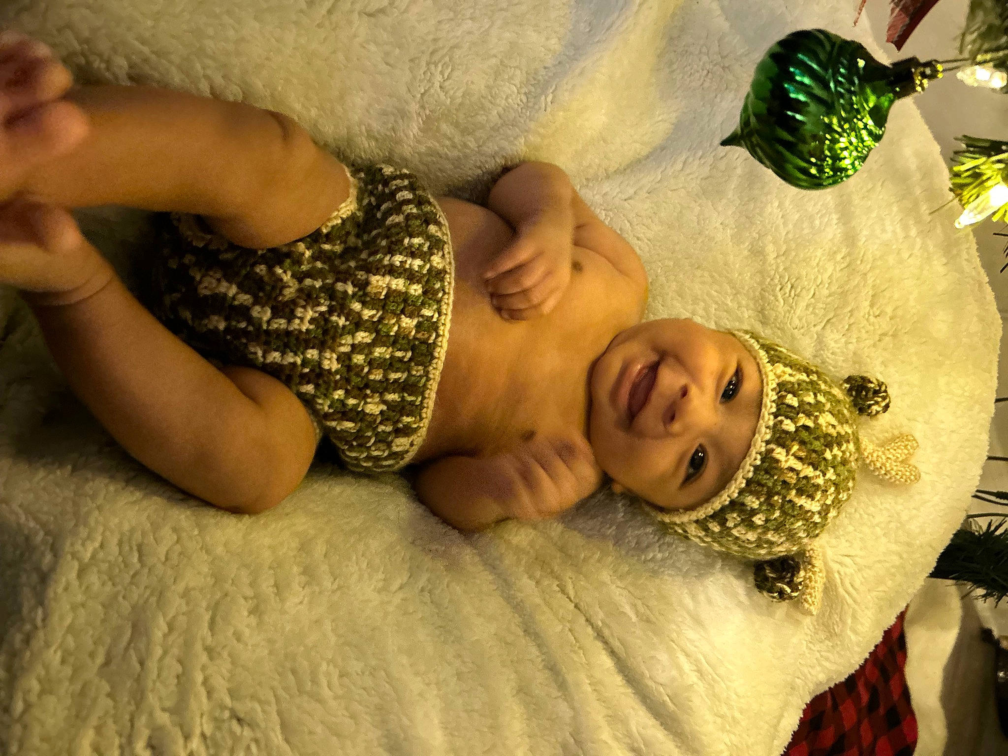 Matthias is registered to the contest to win money with this photo: abdomen, chest, child, comfort, fashion_accessory, fawn, flooring, fun, fur, grass, happy, headwear, human_leg, jewellery, joy, linens, pattern, person, room, skin