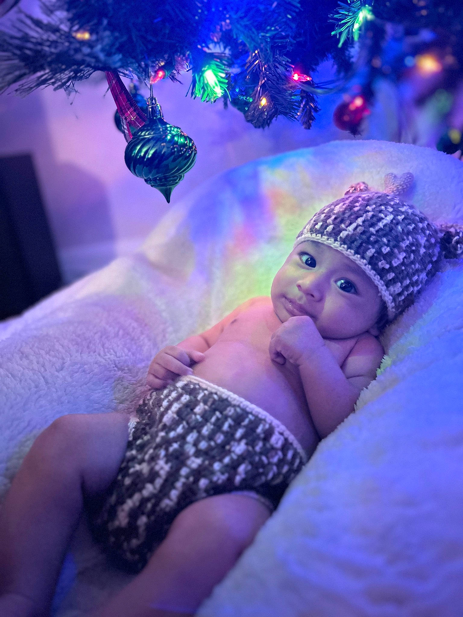 Matthias is registered to the contest to win money with this photo: baby, beauty, darkness, electric_blue, event, flash_photography, happy, headwear, human_body, human_leg, light, magenta, ornament, person, pink, plant, purple, smile, thigh, toddler