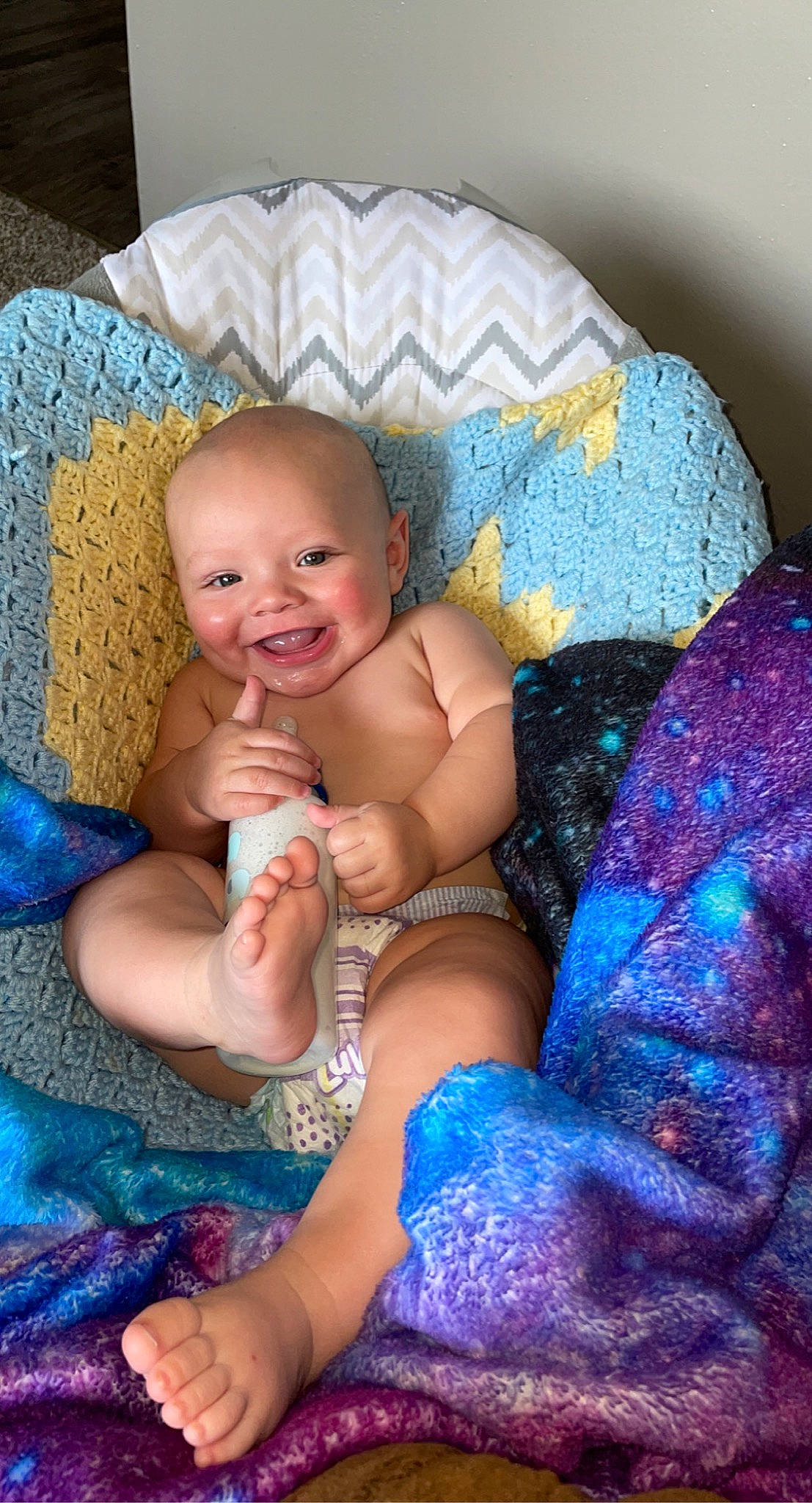 Brixton joined the competition — help win amazing prizes! abdomen, arm, baby, blue, comfort, eye, facial_expression, hairstyle, happy, head, iris, joy, lap, mouth, person, purple, skin, smile, textile, thigh