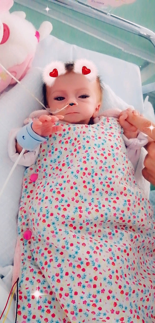 Miyha participe au concours pour gagner de l'argent avec cette photo : baby, baby_toddler_clothing, child, headwear, person, pink, product, skin, toddler