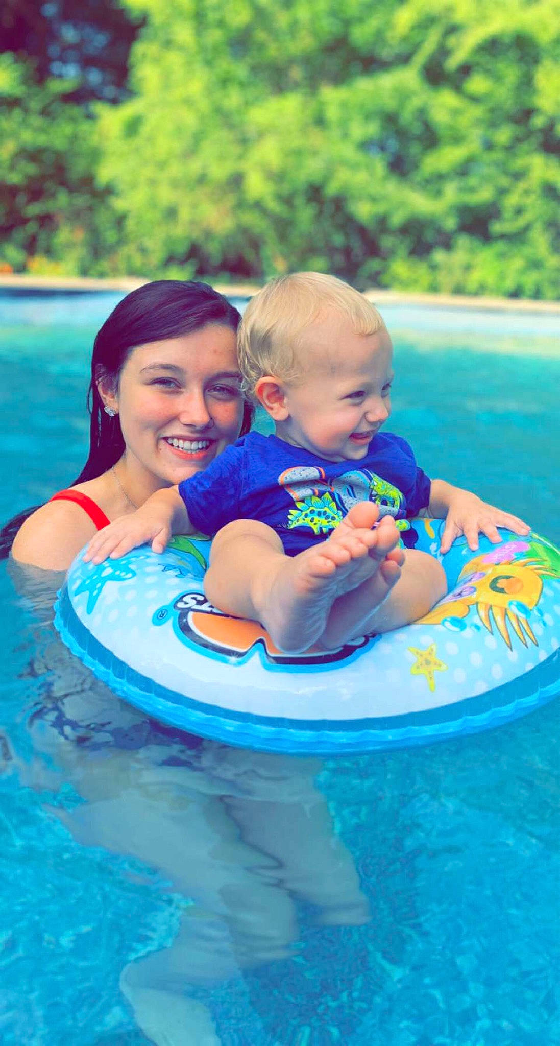 Kasey joined the competition — help win amazing prizes! aqua, baby, baby_float, baby_toddler_clothing, blue, facial_expression, fun, green, happy, interaction, joy, leisure, mammal, outdoor_recreation, person, skin, smile, summer, swimming_pool, toddler