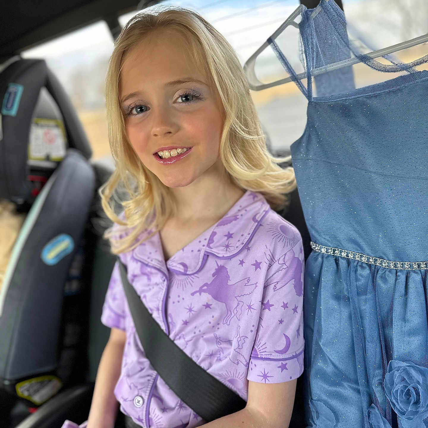 Scarlett joined the competition — help win amazing prizes! accessories, belt, blonde, child, clothing, cushion, dress, face, female, formalwear, girl, hair, head, homedecor, person, photography, portrait, seatbelt, transportation, vehicle