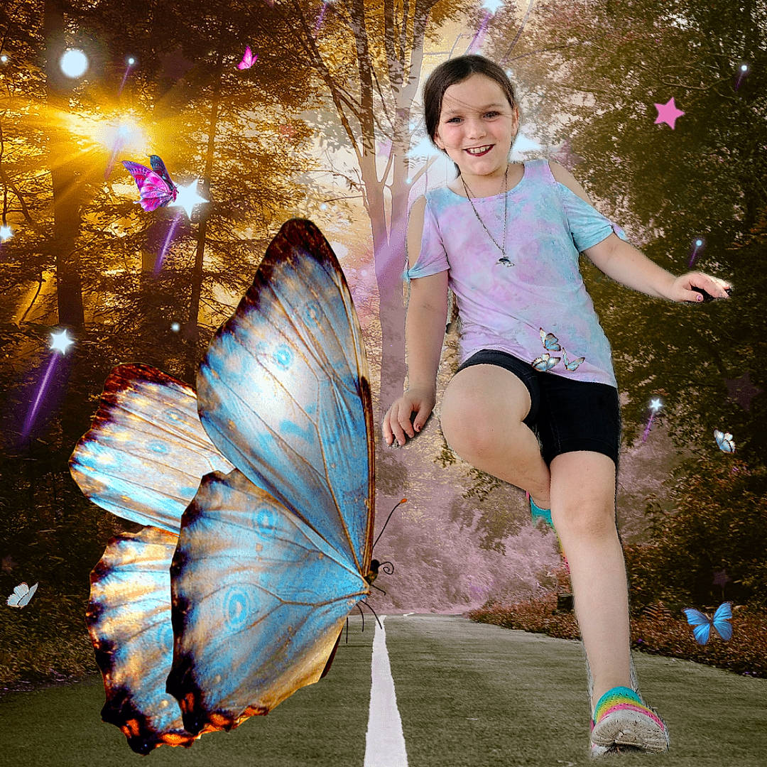 Ashlee is registered to the contest to win money with this photo: arthropod, butterfly, cool, face, flash_photography, fun, grass, happy, insect, joy, knee, leisure, light, moths_and_butterflies, people_in_nature, person, photograph, pollinator, shorts, thigh