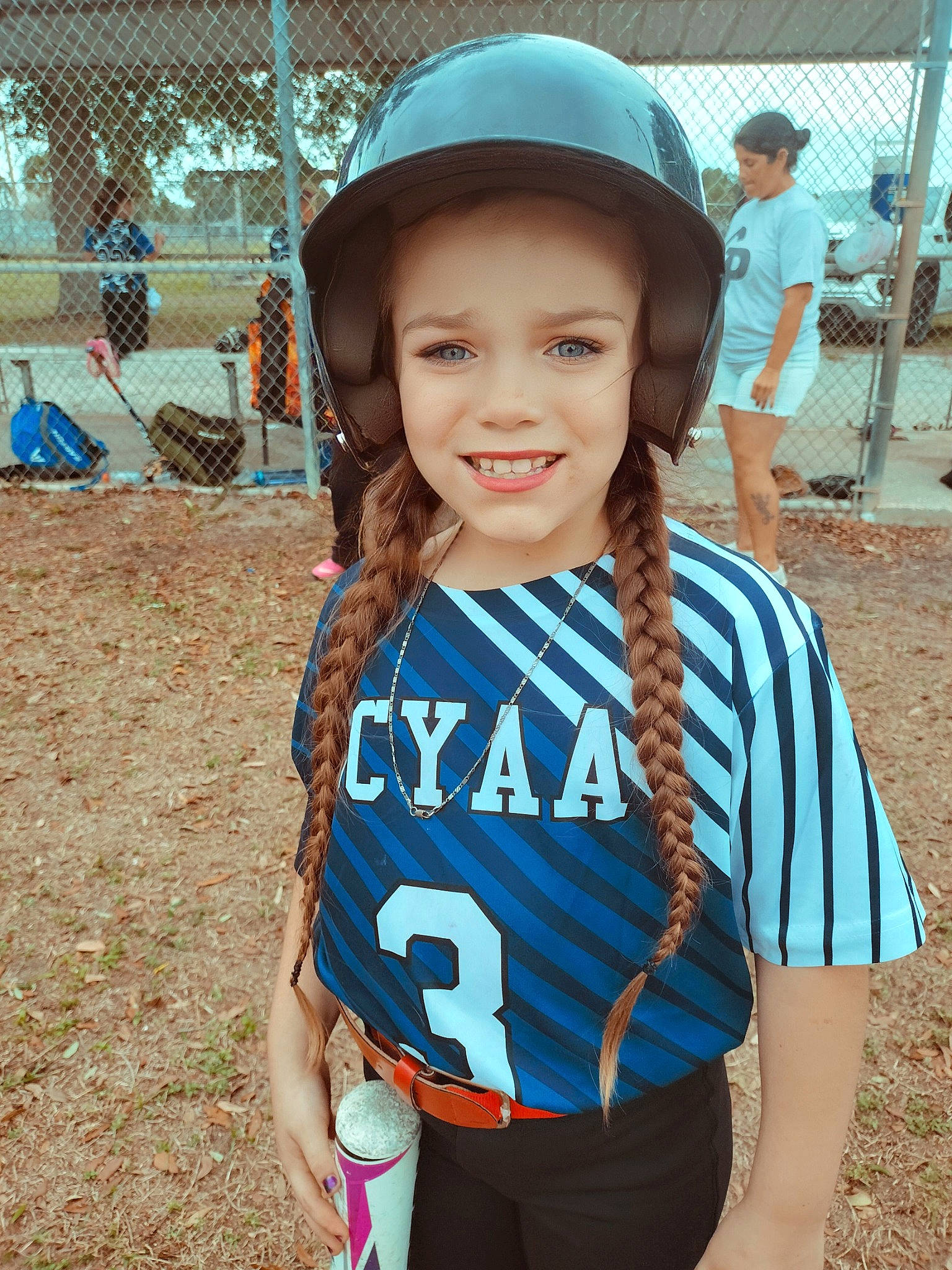 Ashlee is registered to the contest to win money with this photo: arm, azure, baseball_cap, cap, clothing, electric_blue, fun, happy, joy, leisure, neck, person, personal_protective_equipment, recreation, sleeve, smile, style, summer, t_shirt, toddler