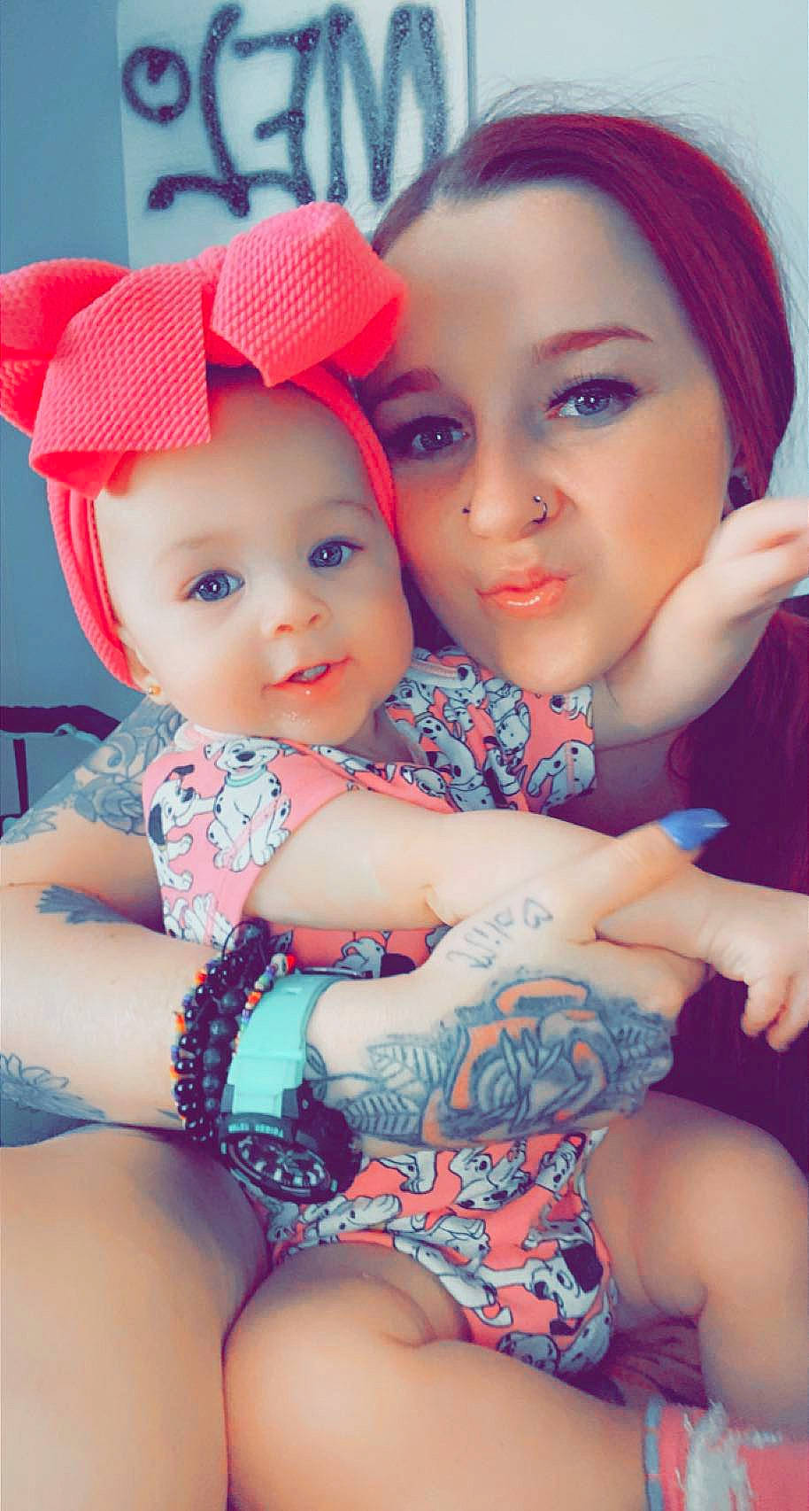 Mila is registered to the contest to win money with this photo: azure, baby_toddler_clothing, cap, chin, cool, eye, facial_expression, fun, happy, hat, head, headwear, human, human_body, lip, muscle, people, person, pink, skin