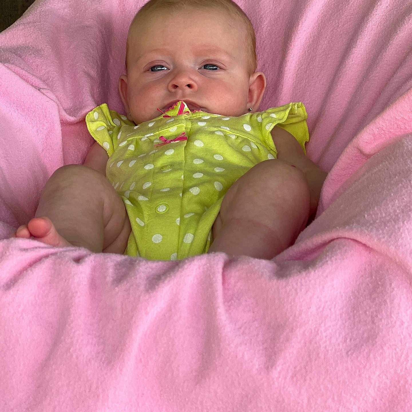 Charlie joined the competition — help win amazing prizes! baby, bed, blanket, bodypart, crib, cushion, diaper, face, finger, furniture, happy, head, homedecor, infantbed, newborn, person, photography, portrait, quilt, smile