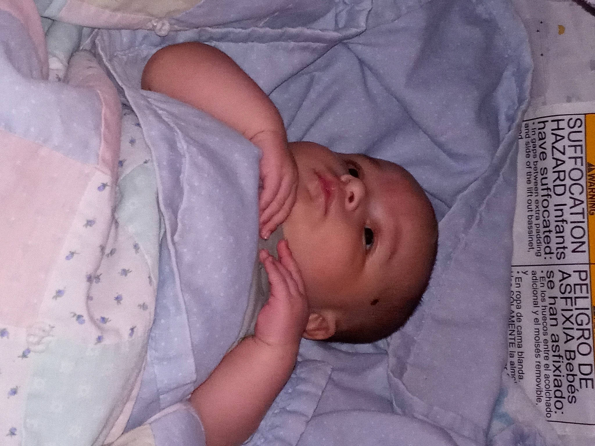 Jareth is registered to the contest to win money with this photo: baby, baby_products, baby_toddler_clothing, bedtime, cheek, child, comfort, eye, head, iris, linens, nap, nose, pattern, person, product, room, skin, sleep, sleeve