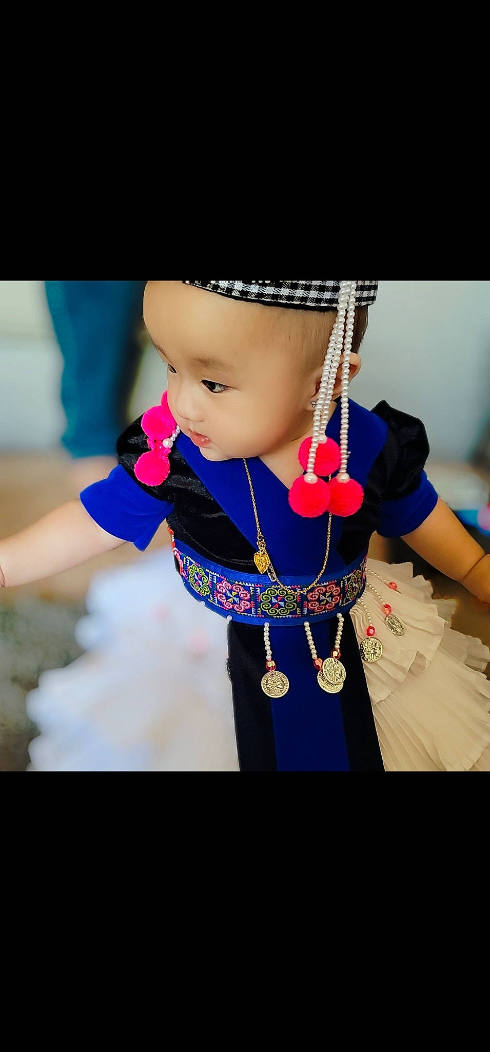 Ameela joined the competition — help win amazing prizes! azure, baby, baby_toddler_clothing, costume_hat, dress, electric_blue, event, fashion_design, fun, gesture, happy, human_body, jewellery, magenta, necklace, person, recreation, shoulder, sleeve, toddler