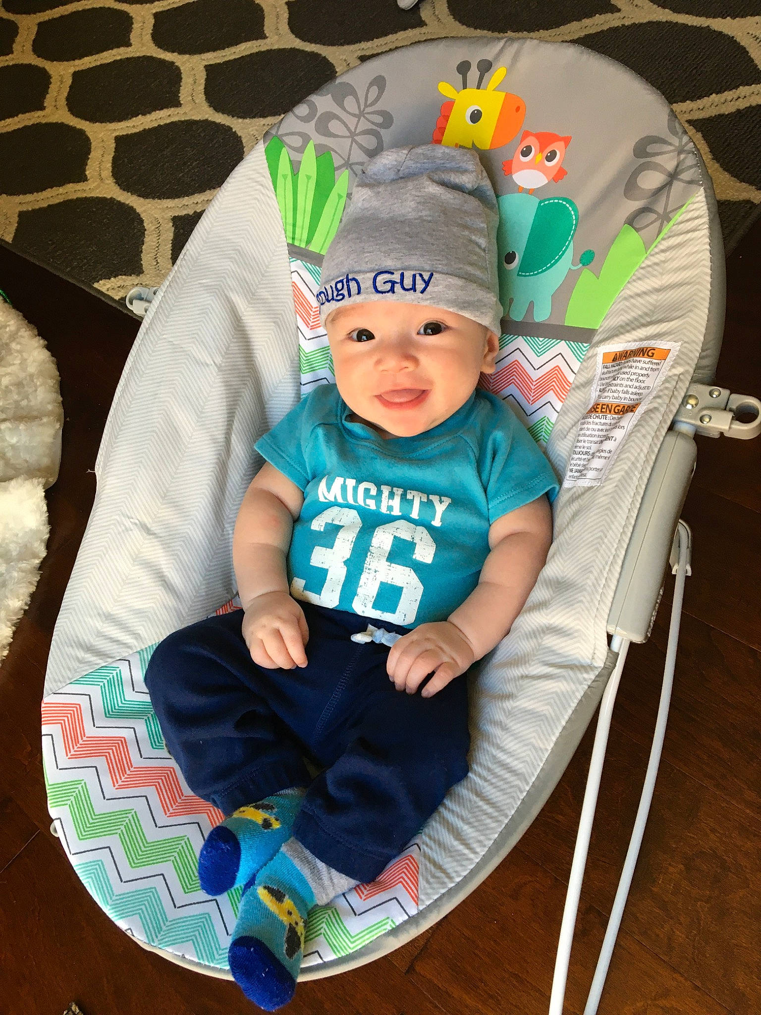 Gavin is registered to the contest to win money with this photo: baby, baby_products, baby_toddler_clothing, chair, child, headgear, headwear, person, product, sitting, toddler