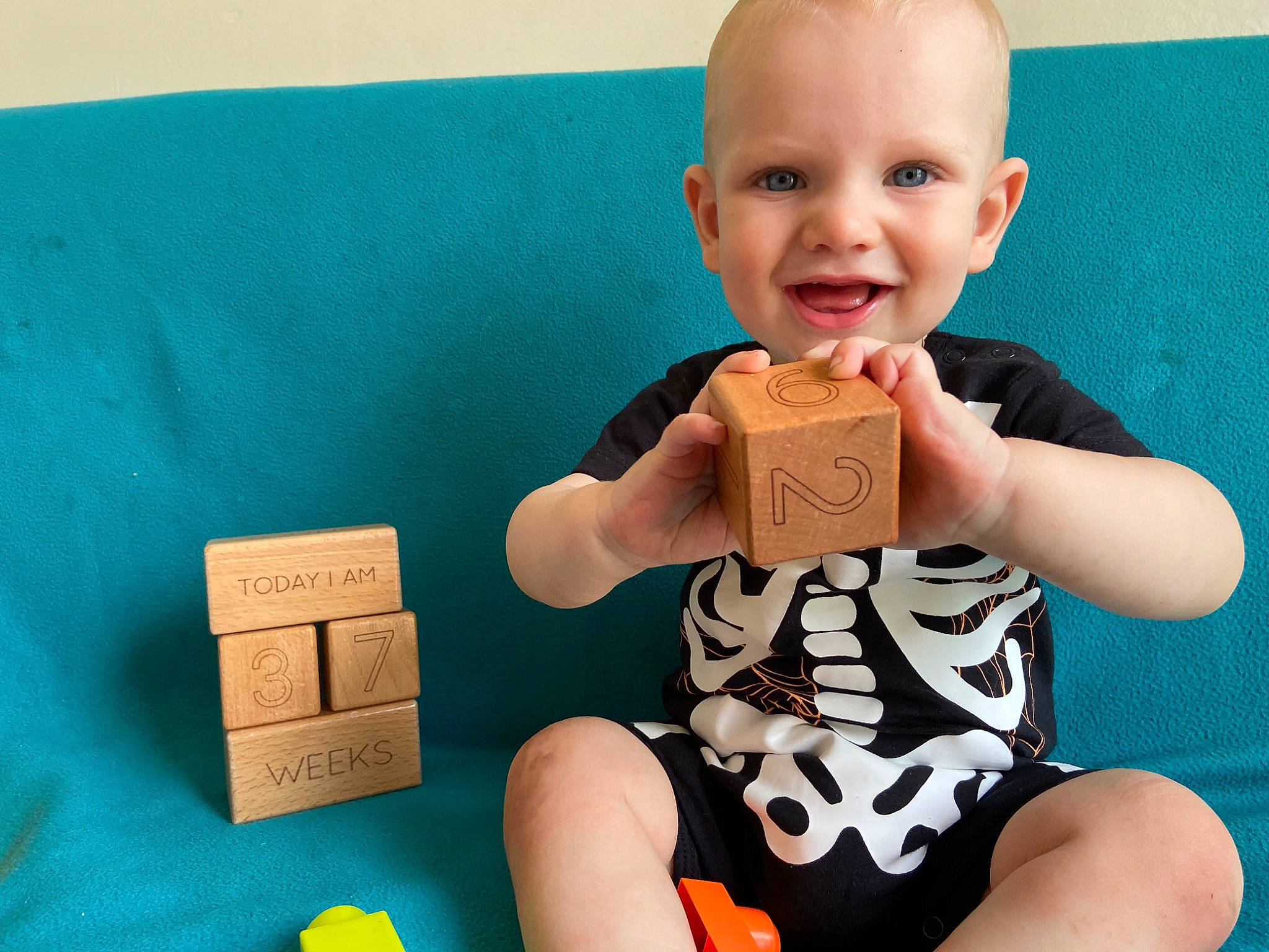 Elijah joined the competition — help win amazing prizes! arm, baby, baby_products, baby_toddler_clothing, baby_toys, child, finger, joint, leg, muscle, person, play, sitting, thumb, toddler, toy, toy_block