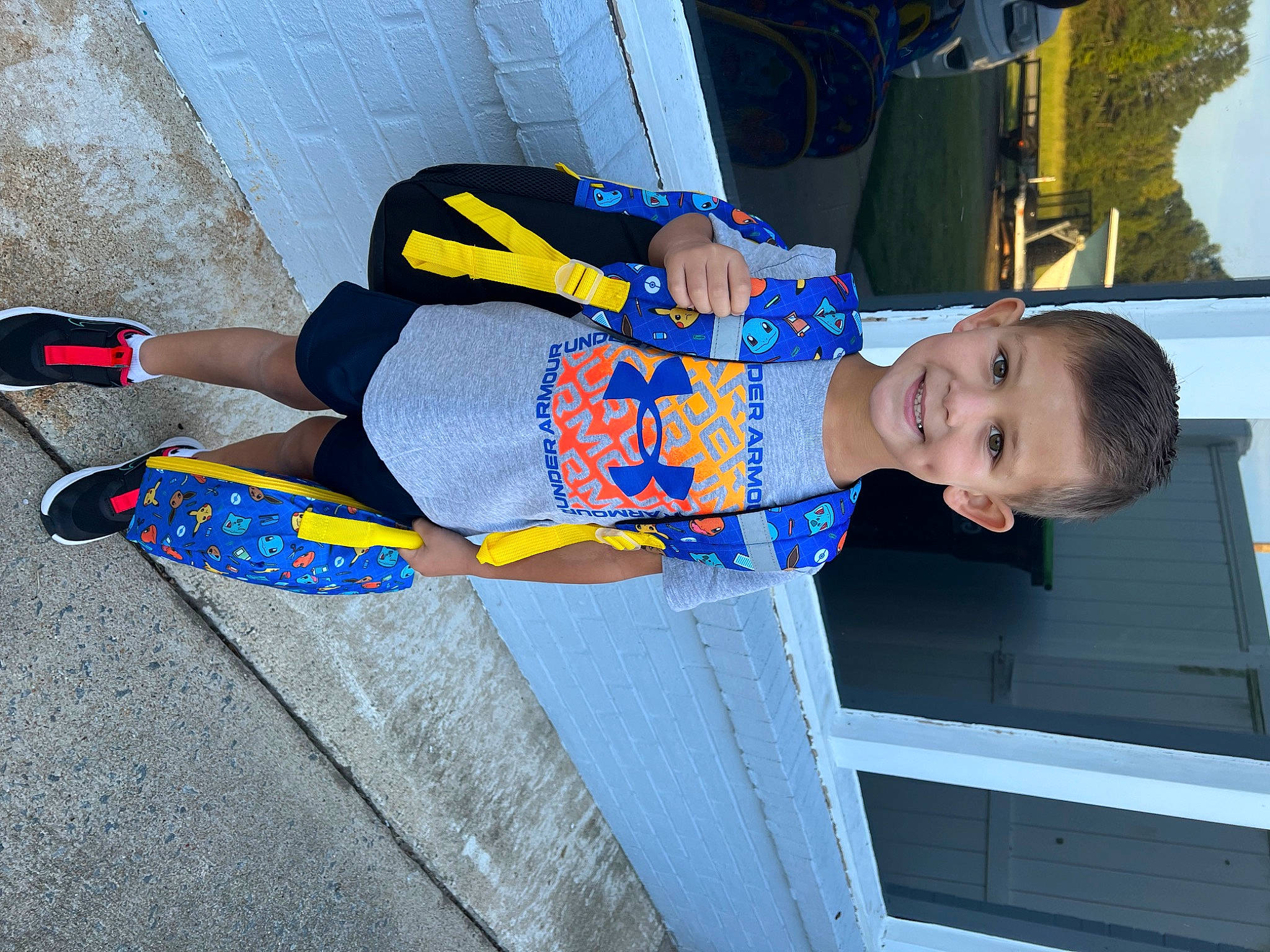 Jackson is registered to the contest to win money with this photo: baby_toddler_clothing, child, concrete, elbow, electric_blue, fun, human_leg, joy, leisure, person, smile, t_shirt, thigh, toddler, travel, vacation, walking_shoe