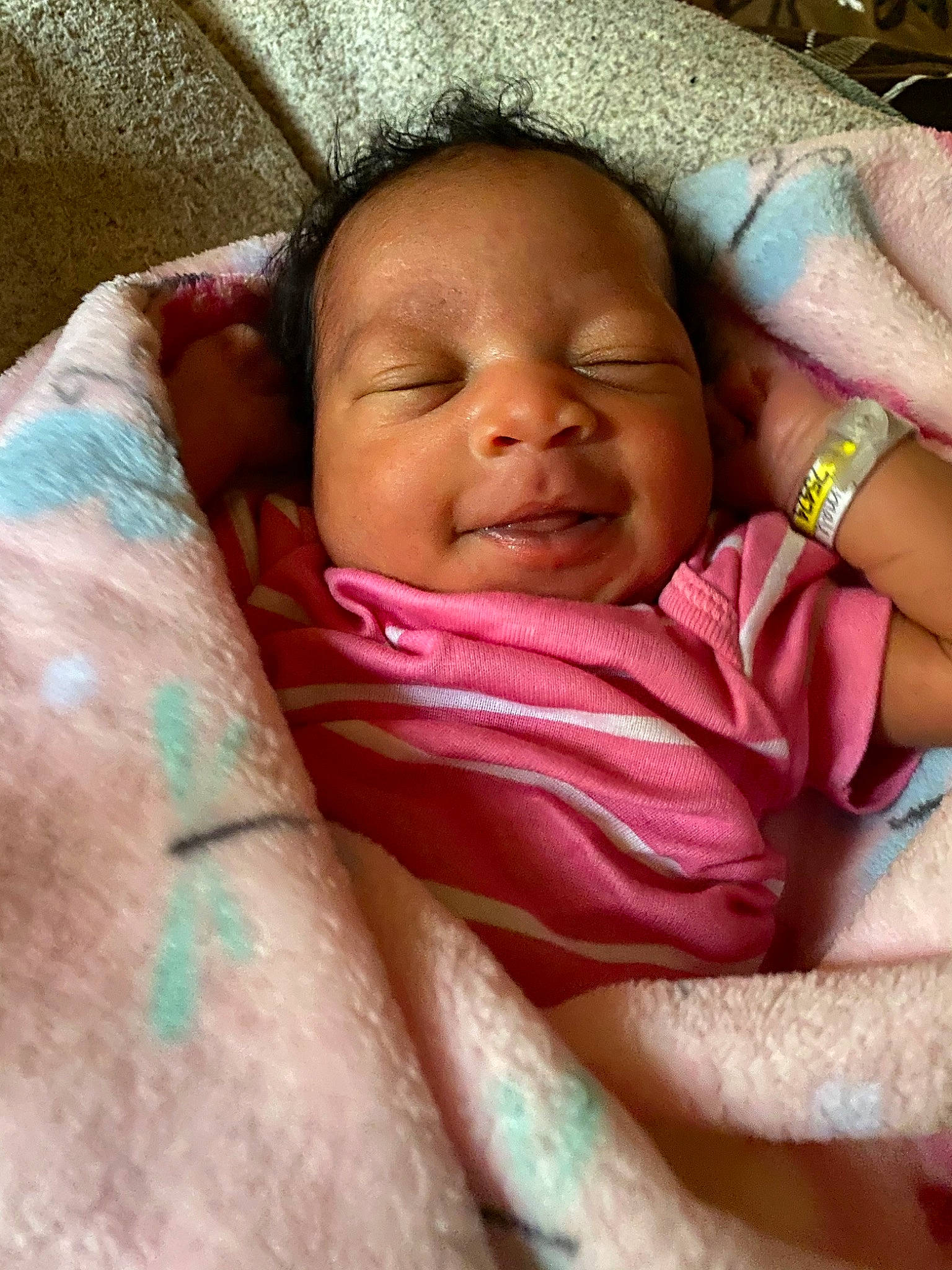 Kyleigh is registered to the contest to win money with this photo: baby, birth, cheek, child, eye, face, finger, forehead, hand, head, lip, mouth, nose, person, pink, skin, smile, toddler, wrinkle