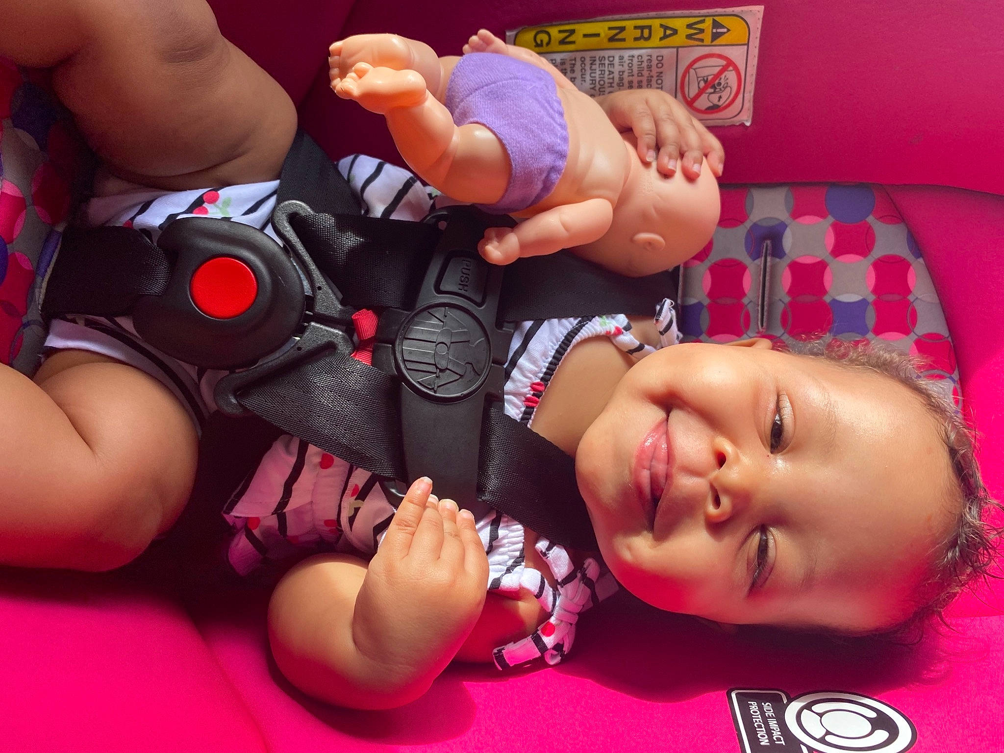 Mylie is registered to the contest to win money with this photo: arm, baby_toddler_clothing, cheek, comfort, facial_expression, finger, gesture, hand, human, human_body, joint, joy, leg, mouth, muscle, person, photograph, product, skin, smile