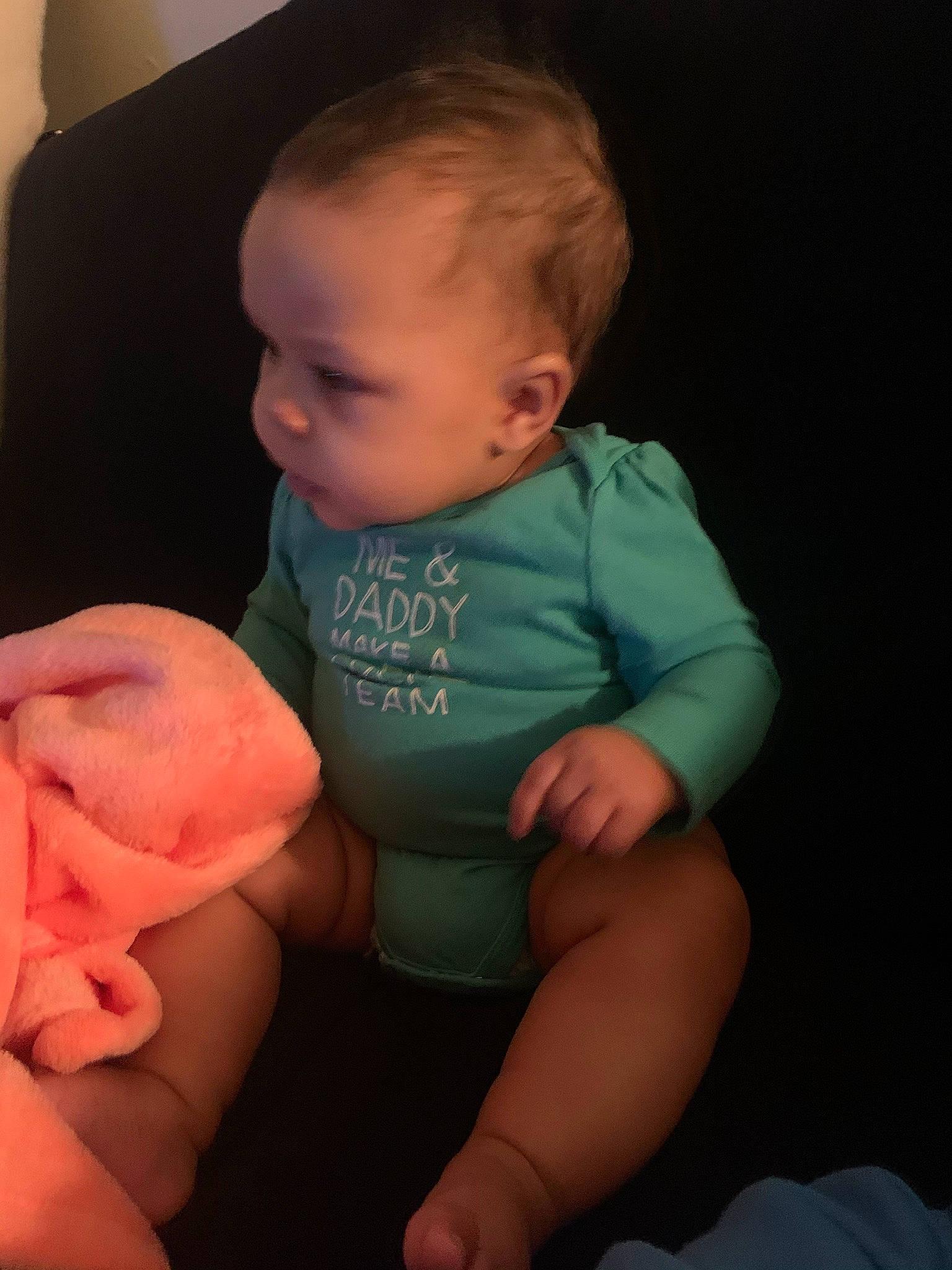 Mylie is registered to the contest to win money with this photo: baby, baby_toddler_clothing, cheek, chin, comfort, eye, finger, gesture, human_body, iris, knee, lap, mouth, neck, nose, person, shoulder, skin, stomach, thigh