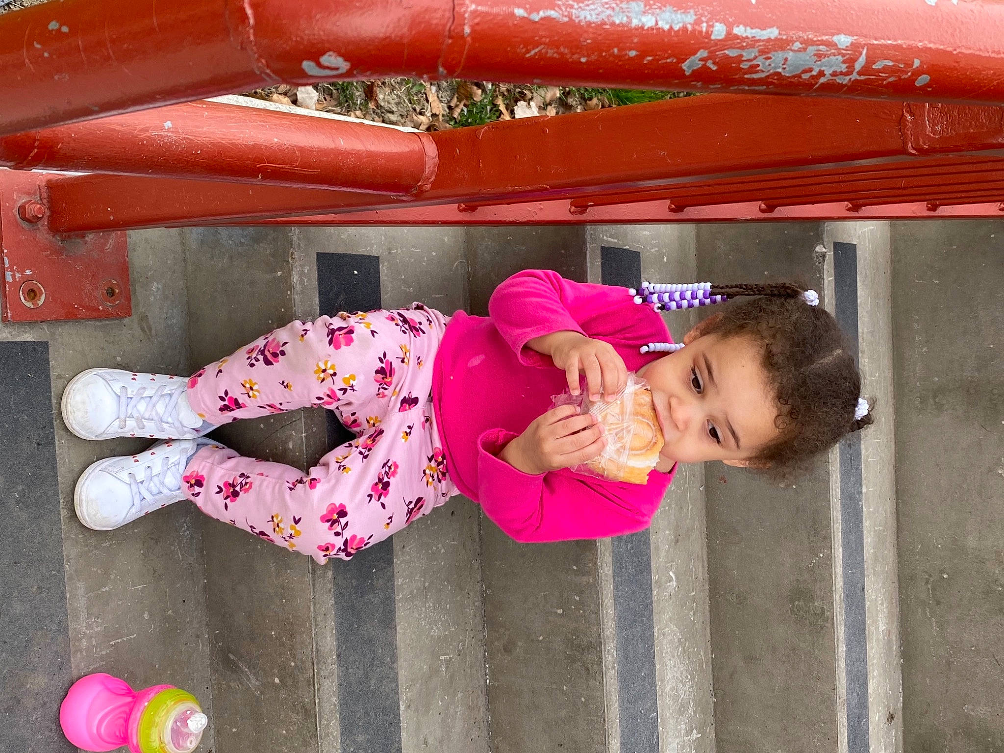 Ayva is registered to the contest to win money with this photo: baby_toddler_clothing, child, fun, green, happy, human_body, human_settlement, leisure, line, magenta, pattern, person, pink, play, public_space, red, smile, sock, toddler, white