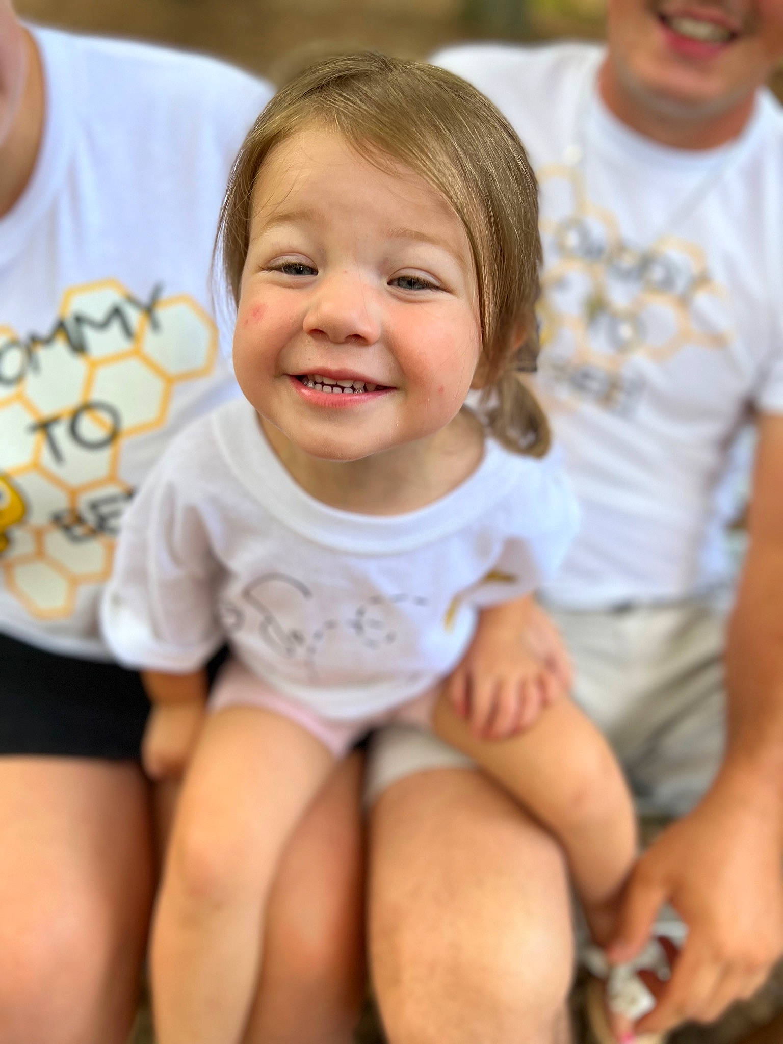 Weslyn is registered to the contest to win money with this photo: arm, baby_toddler_clothing, cheek, face, facial_expression, finger, hairstyle, happy, head, human, joy, organ, people, person, photograph, product, skin, sleeve, smile, thigh