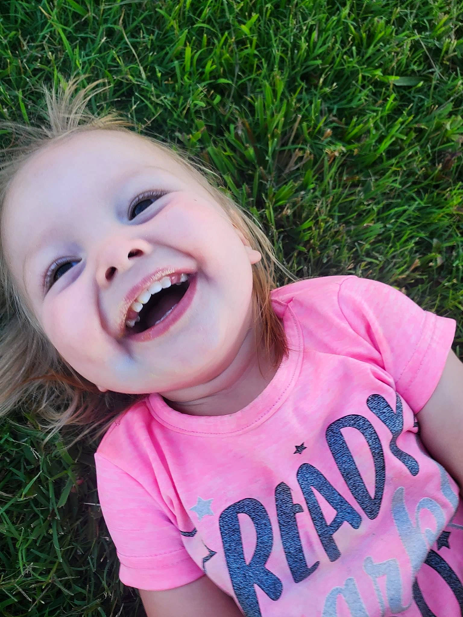 Harper joined the competition — help win amazing prizes! baby_laughing, baby_toddler_clothing, cheek, cool, eye, eyebrow, grass, happy, iris, leisure, lip, mouth, nose, people_in_nature, person, pink, plant, skin, smile, toddler