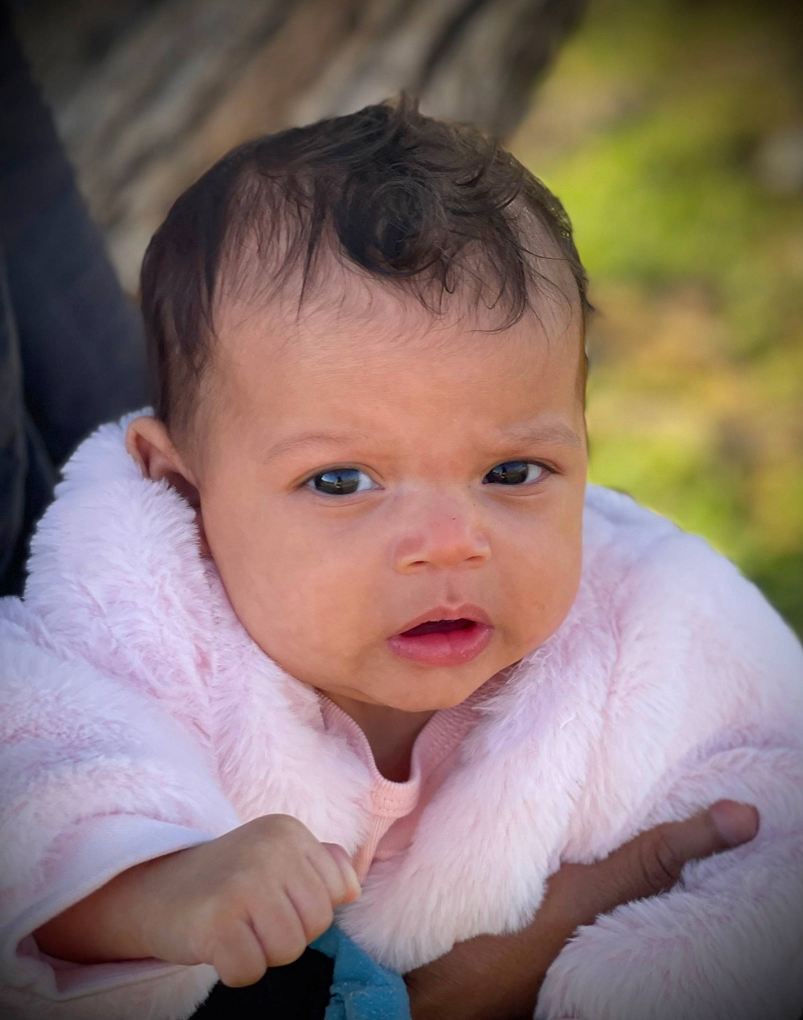 Kelani is registered to the contest to win money with this photo: baby, baby_toddler_clothing, cheek, eyelash, finger, flash_photography, fun, gesture, grass, hand, happy, iris, lip, nose, person, plant, sitting, skin, smile, toddler