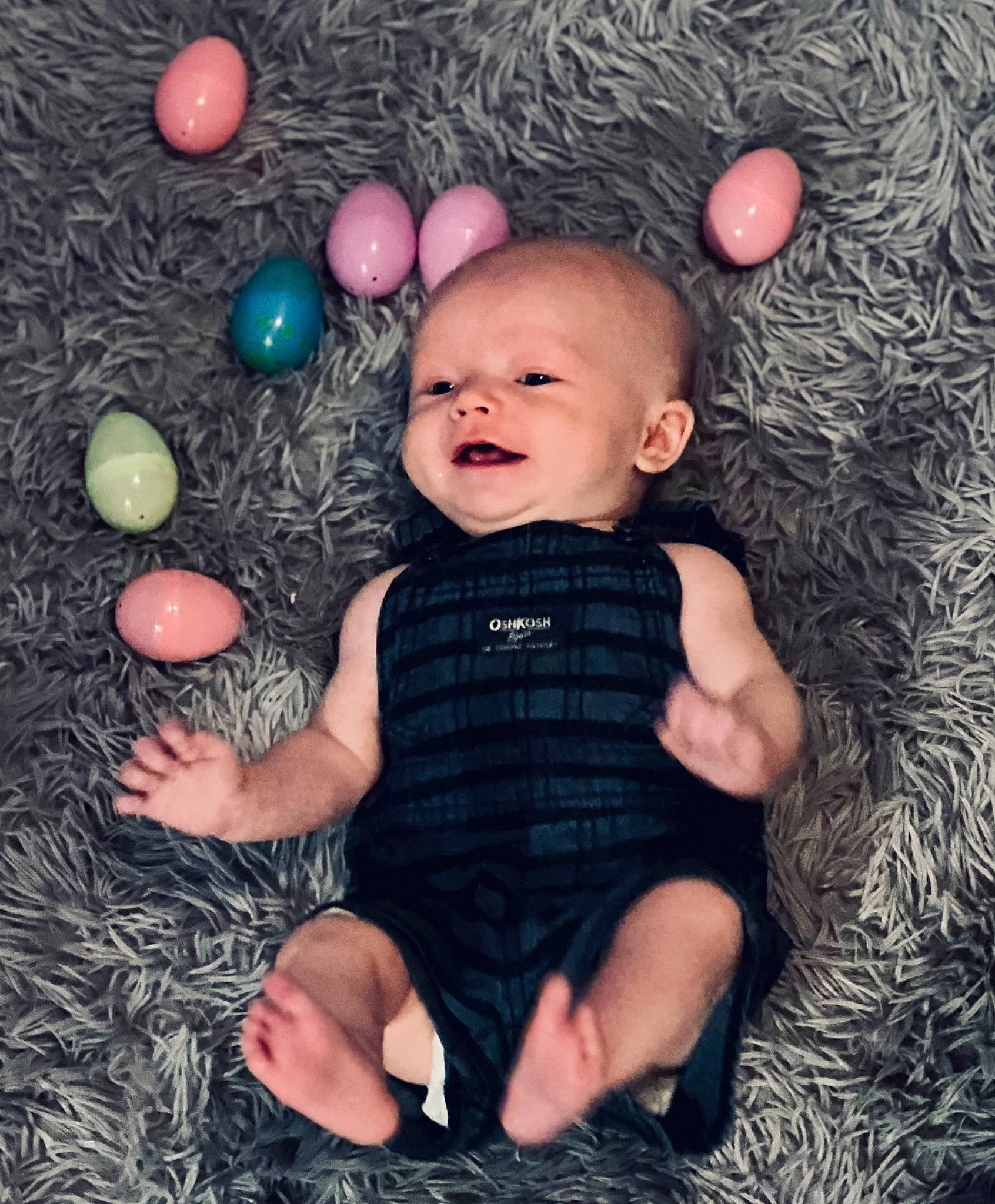 Jameson is registered to the contest to win money with this photo: baby, baby_toddler_clothing, cheek, child, eye, facial_expression, finger, flash_photography, fun, gesture, grass, happy, head, organ, people_in_nature, person, skin, smile, textile, toddler