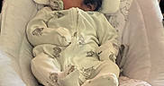 Akari is registered to the contest to win money with this photo: baby, baby_rocker, bear_prints, child, comfort, cozy, curly_hair, cute, indoor, infant_clothing, newborn, nursery, pacifier, peaceful, person, portrait, resting, sleeping, soft_padding, toddler