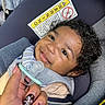 Akari joined the competition — help win amazing prizes! baby, infant, smile, curly_hair, car_seat, pacifier, hand, nail_art, close_up, child, seatbelt, fabric, portrait, cute, happy, person, indoors, skin, fingers, comfort